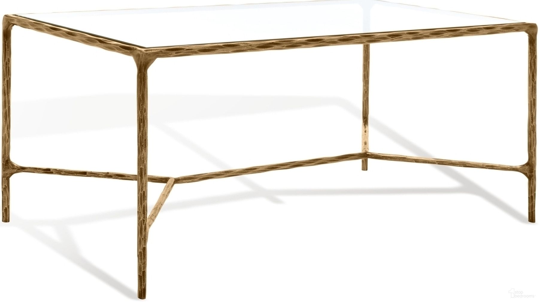 The appearance of Jessa Metal Coffee Table In Brass designed by Safavieh Couture in the modern / contemporary interior design. This brass piece of furniture  was selected by 1StopBedrooms from Jessa Collection to add a touch of cosiness and style into your home. Sku: SFV9520A. Material: Iron.