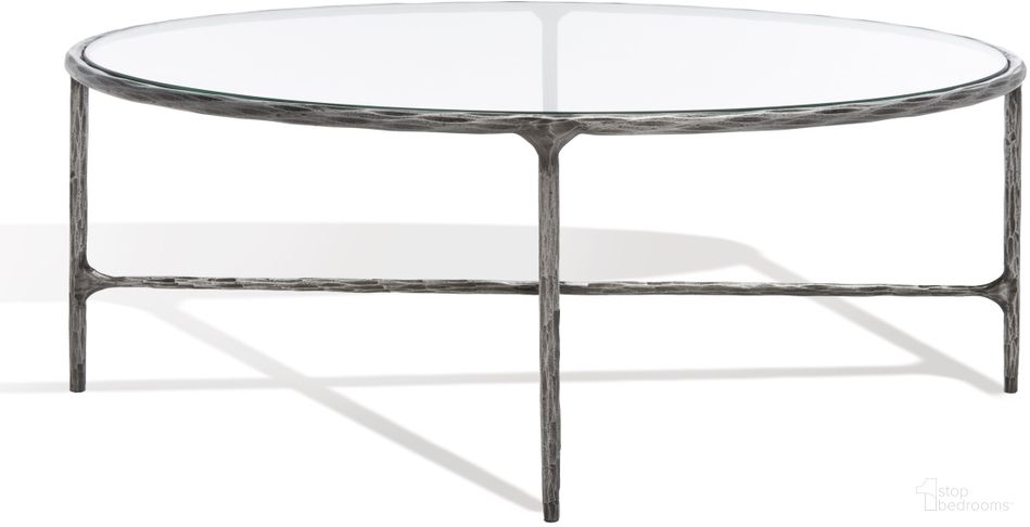 The appearance of Jessa Oval Metal Coffee Table In Silver designed by Safavieh Couture in the modern / contemporary interior design. This silver piece of furniture  was selected by 1StopBedrooms from Jessa Collection to add a touch of cosiness and style into your home. Sku: SFV9521B. Material: Iron.
