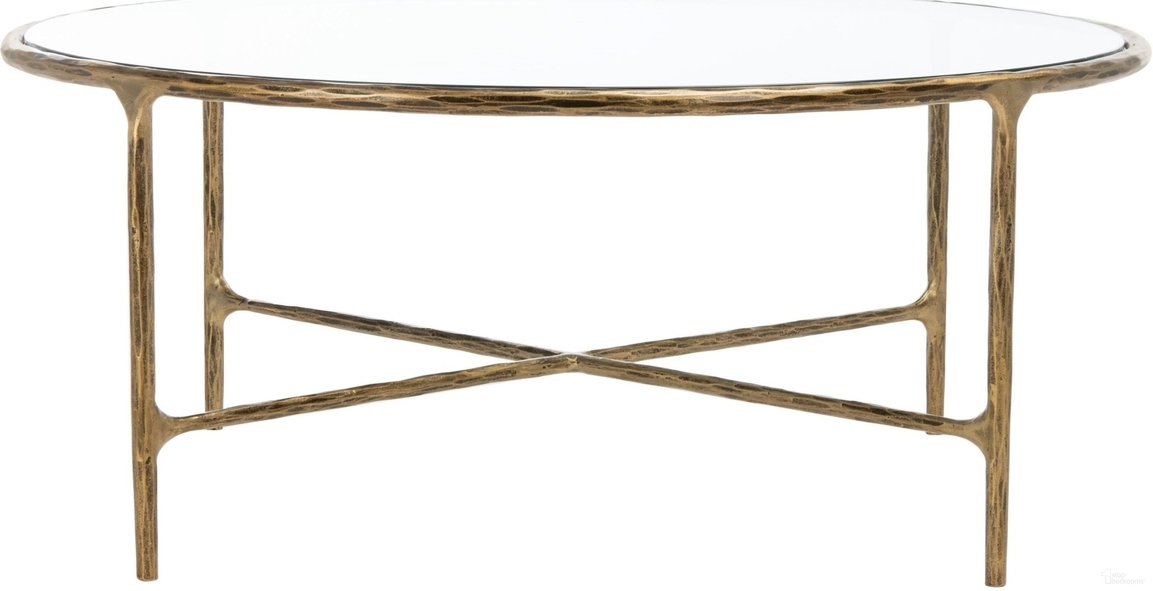 The appearance of Jessa Round Metal Coffee Table In Brass designed by Safavieh Couture in the glam interior design. This brass piece of furniture  was selected by 1StopBedrooms from Jessa Collection to add a touch of cosiness and style into your home. Sku: SFV9501A. Material: Metal.