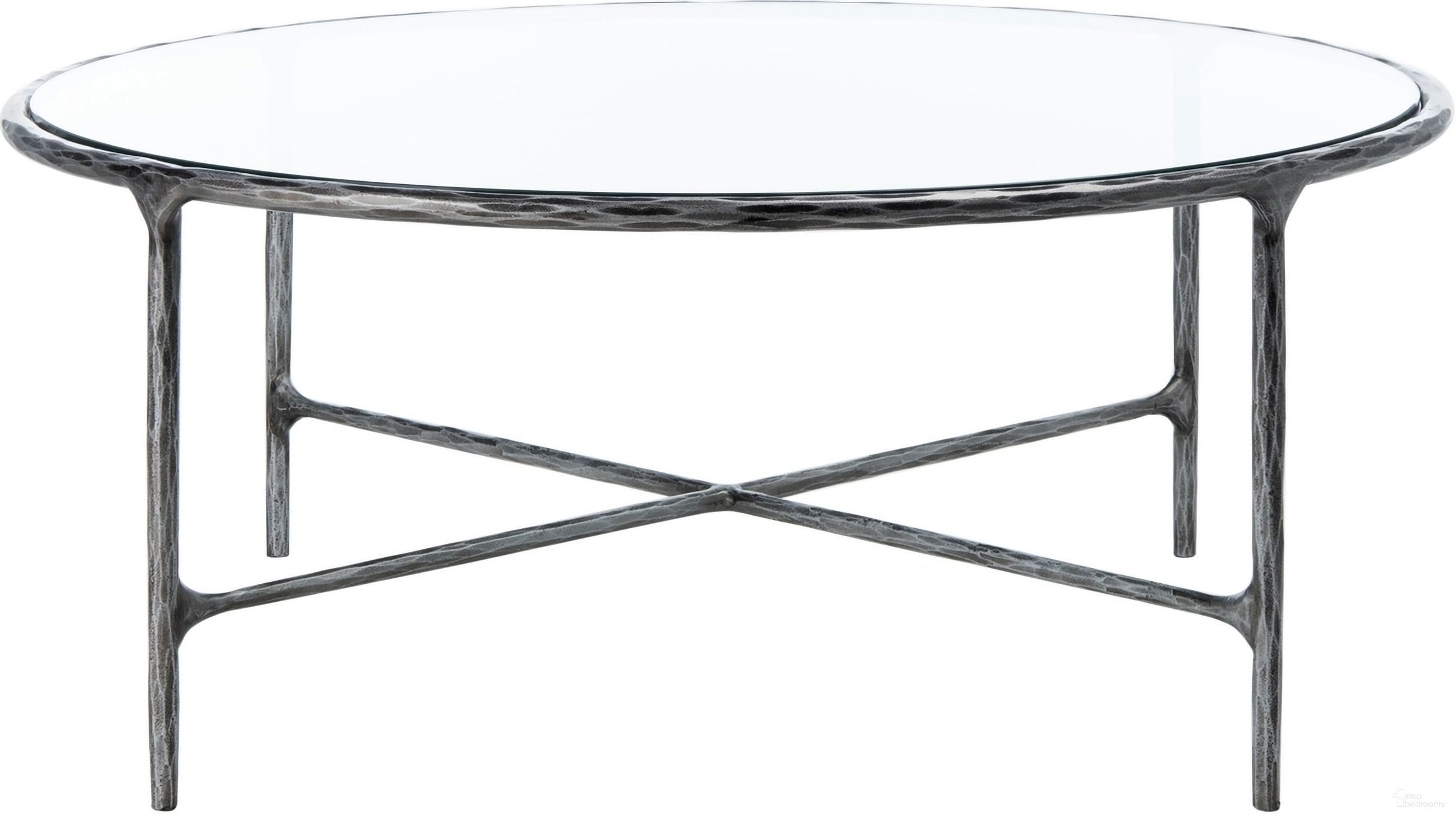 The appearance of Jessa Round Metal Coffee Table In Silver designed by Safavieh Couture in the glam interior design. This silver piece of furniture  was selected by 1StopBedrooms from Jessa Collection to add a touch of cosiness and style into your home. Sku: SFV9501B. Material: Metal.