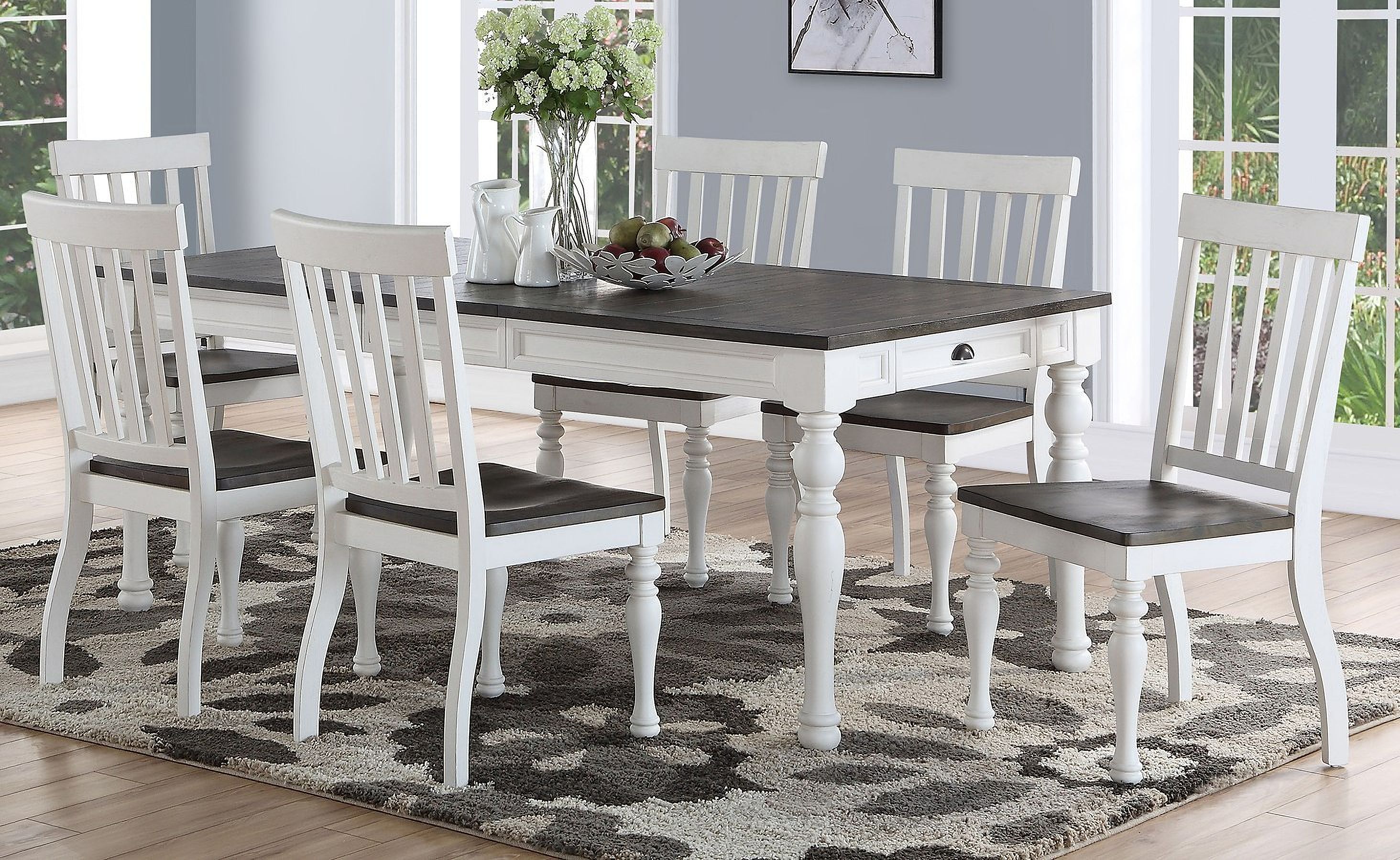 The appearance of Joanna Dining Room Set designed by Steve Silver in the traditional interior design. This ivory piece of furniture was selected by 1StopBedrooms from Joanna Collection to add a touch of cosiness and style into your home. Sku: JA500T;JA500S. Table Base Style: Legs. Material: Wood. Table Top Shape: Rectangular. Size: 40".