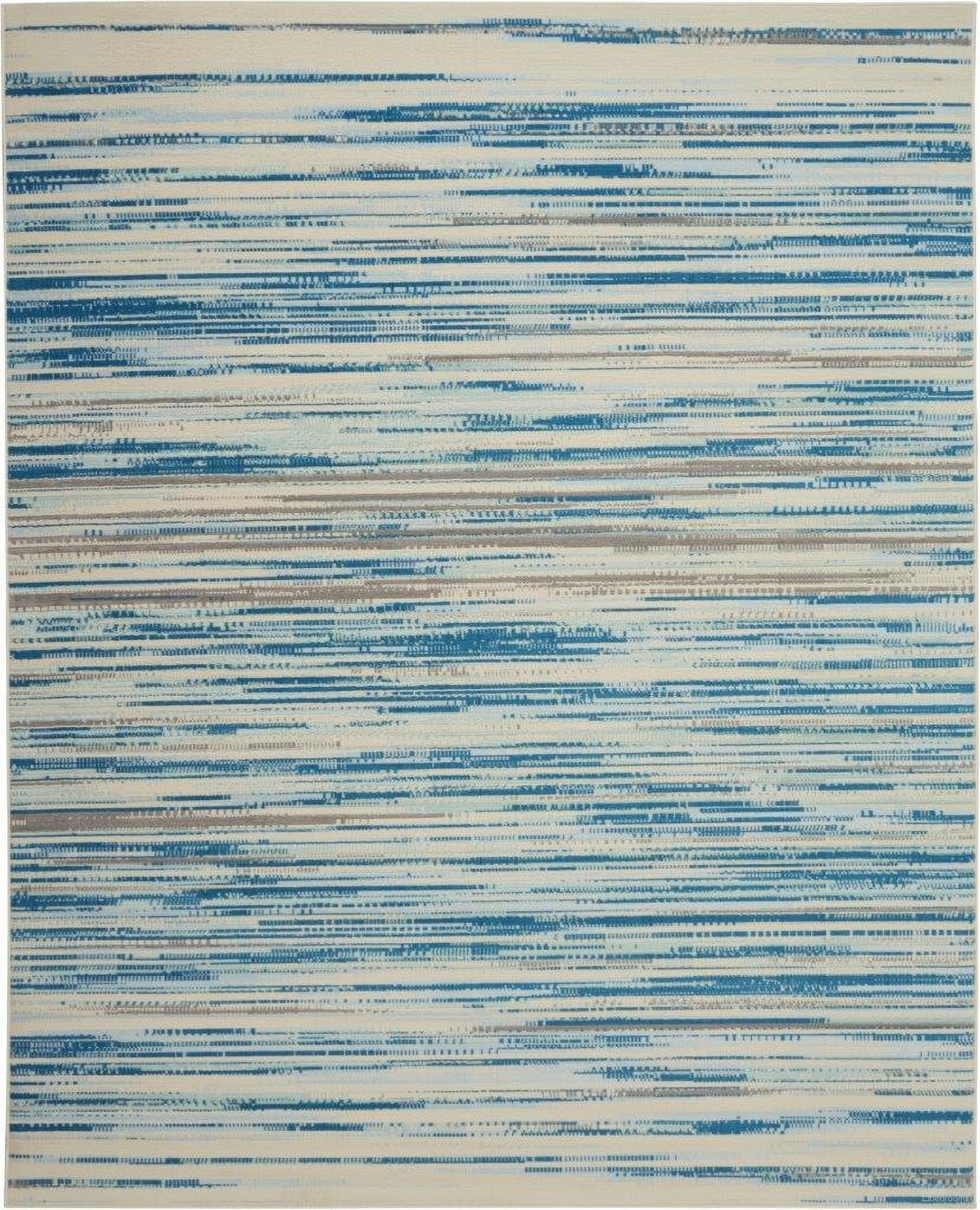 The appearance of Jubilant Blue 8'6" x 12' Area Rug designed by Nourison in the modern / contemporary interior design. This blue piece of furniture was selected by 1StopBedrooms from Jubilant Collection to add a touch of cosiness and style into your home. Sku: 99446760982. Material: Polypropylene.