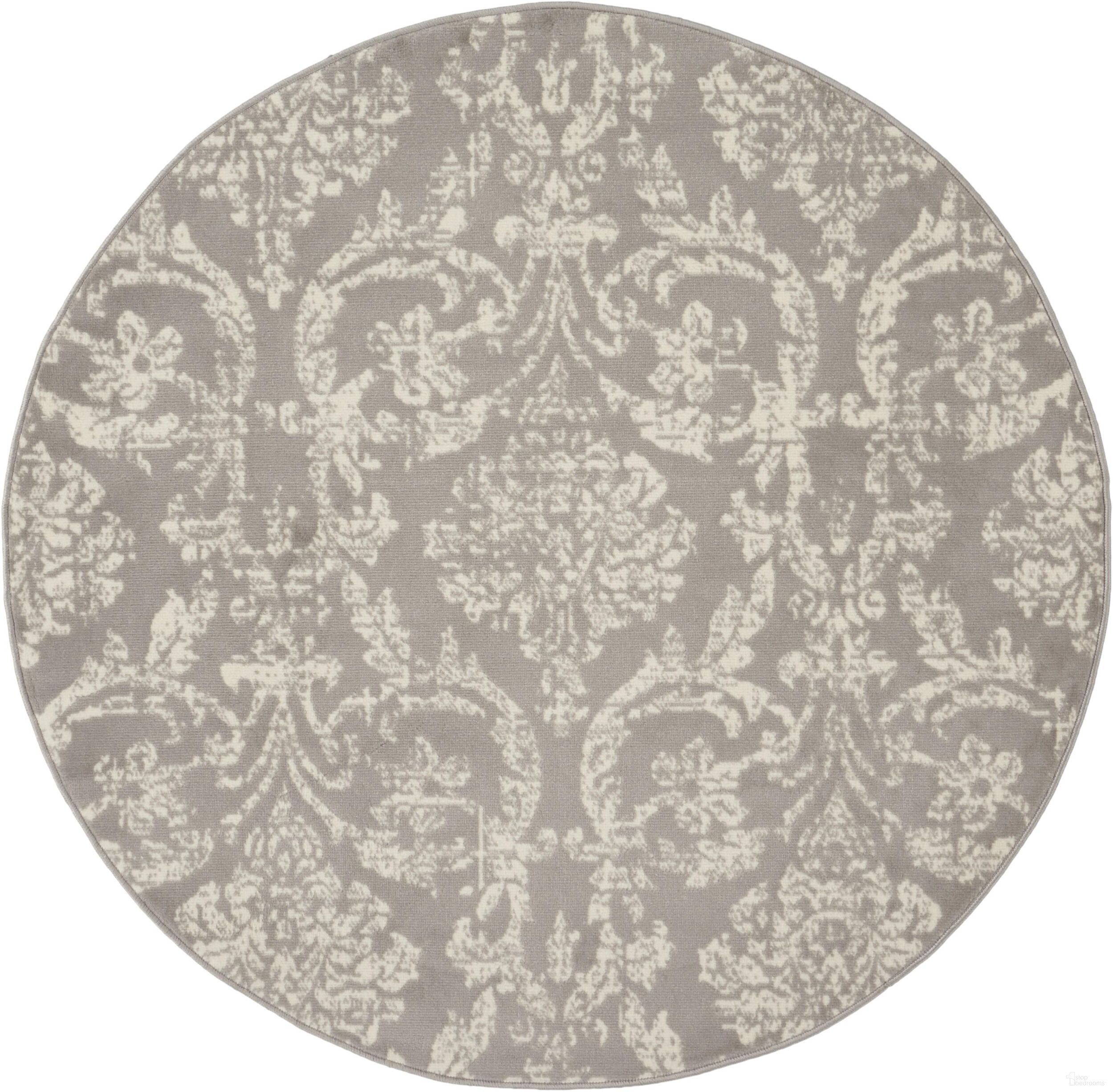 The appearance of Jubilant Grey 5'3" x 5'3" Round Vintage Area Rug designed by Nourison in the rustic / southwestern interior design. This grey piece of furniture  was selected by 1StopBedrooms from Jubilant Collection to add a touch of cosiness and style into your home. Sku: 99446478924. Material: Polypropylene.