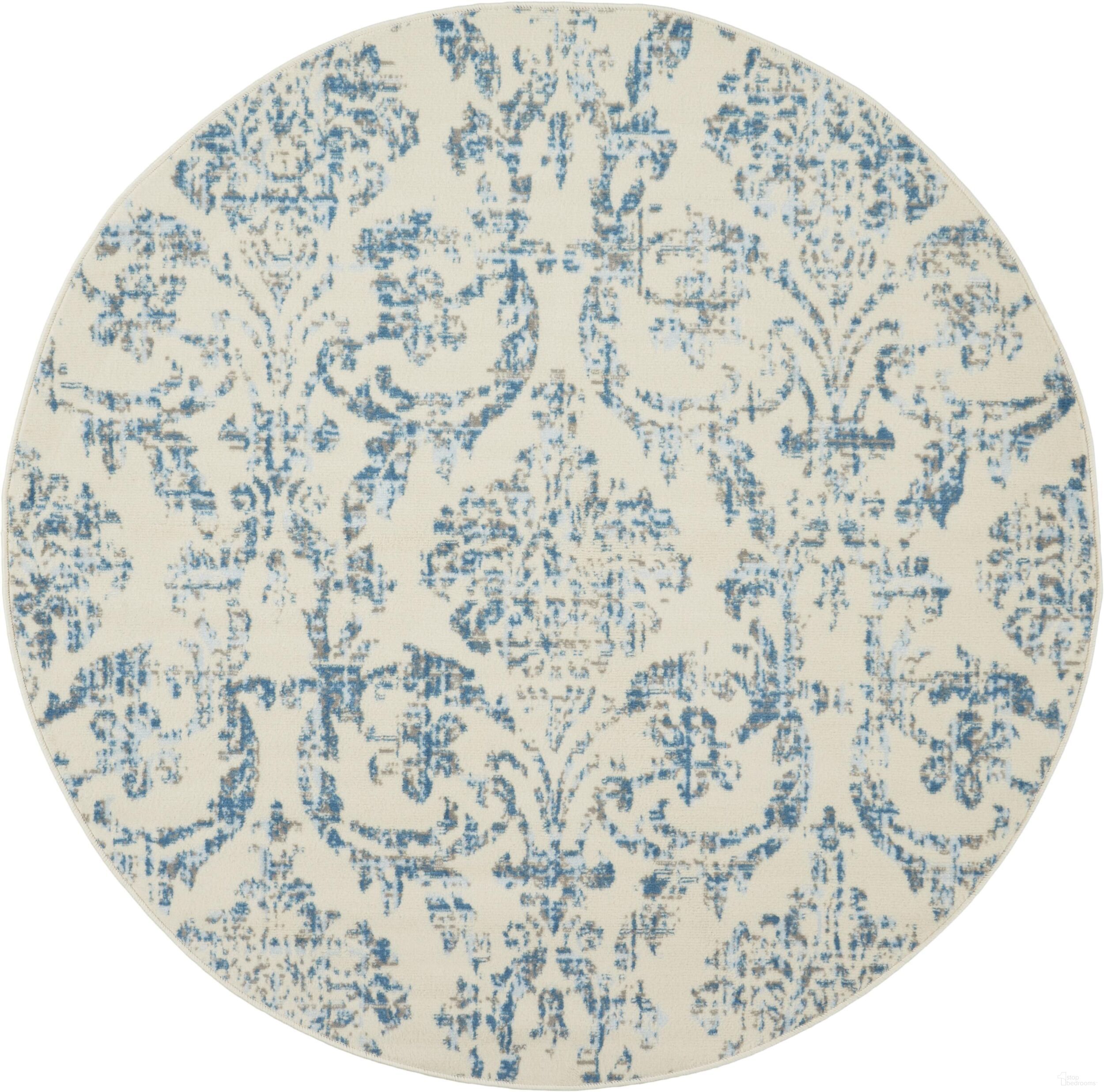The appearance of Jubilant Ivory and Blue 5'3" x 5'3" Round Vintage Area Rug designed by Nourison in the rustic / southwestern interior design. This ivory and blue piece of furniture was selected by 1StopBedrooms from Jubilant Collection to add a touch of cosiness and style into your home. Sku: 99446478771. Material: Polypropylene.