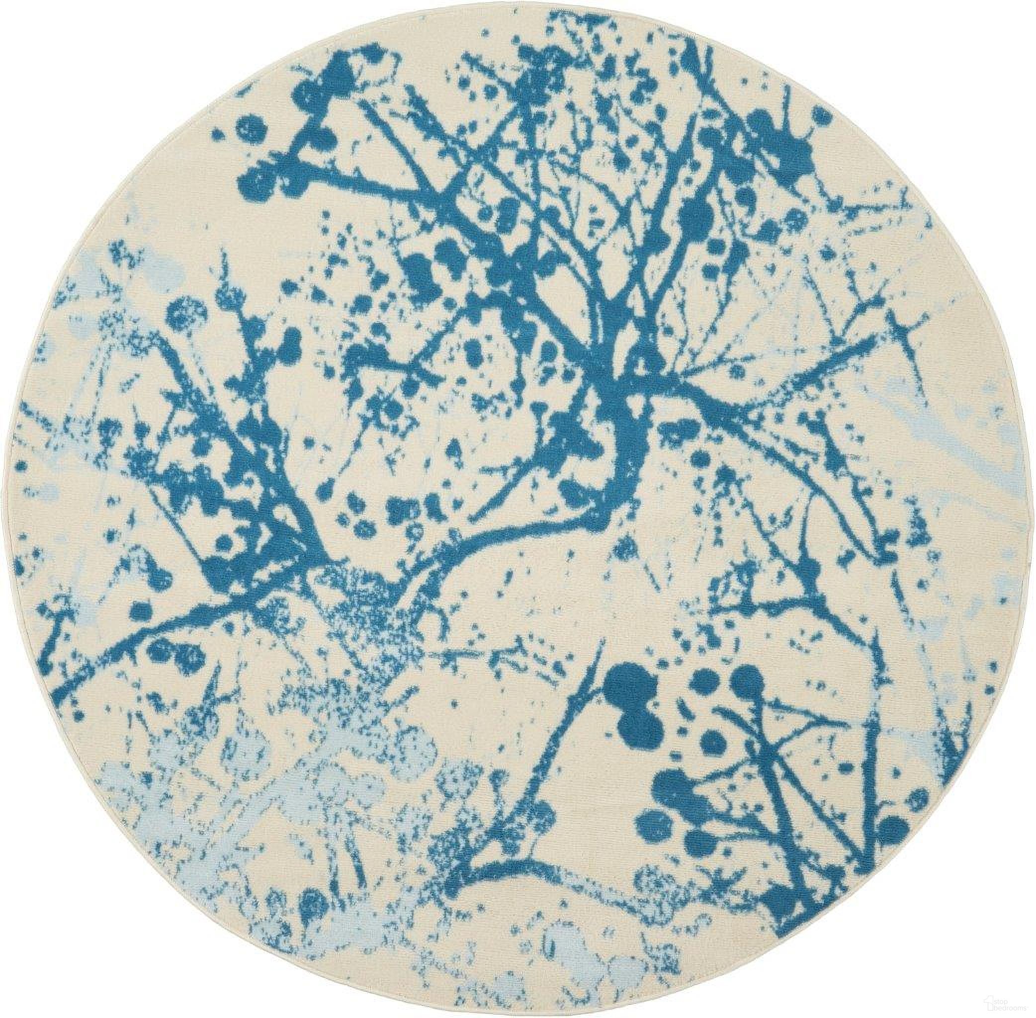 The appearance of Jubilant Ivory and Blue 5'3" x 5'3" Round Area Rug designed by Nourison in the modern / contemporary interior design. This ivory and blue piece of furniture was selected by 1StopBedrooms from Jubilant Collection to add a touch of cosiness and style into your home. Sku: 99446479082. Material: Polypropylene.