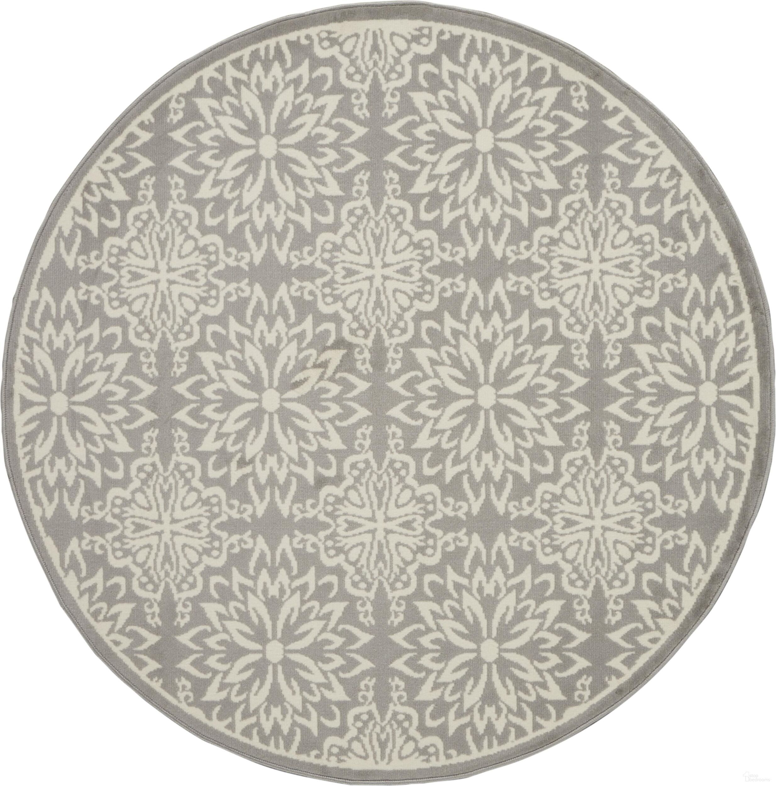 The appearance of Jubilant Ivory and Grey 5'3" x 5'3" Round Area Rug designed by Nourison in the transitional interior design. This ivory and grey piece of furniture was selected by 1StopBedrooms from Jubilant Collection to add a touch of cosiness and style into your home. Sku: 99446478375. Material: Polypropylene.
