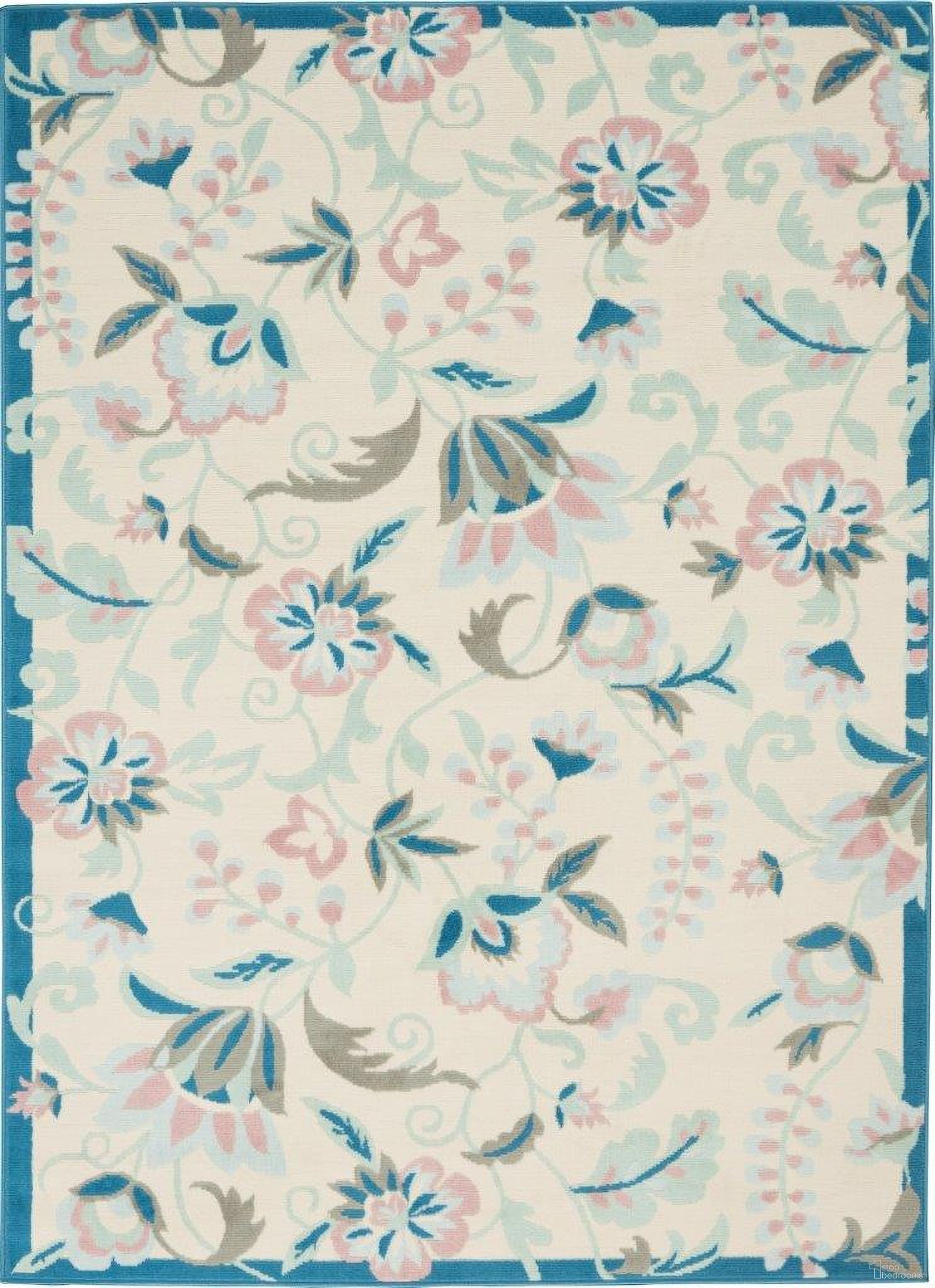 The appearance of Jubilant Ivory and Multicolor 5'3" x 7'3" Area Rug designed by Nourison in the modern / contemporary interior design. This ivory and multicolor piece of furniture  was selected by 1StopBedrooms from Jubilant Collection to add a touch of cosiness and style into your home. Sku: 99446479259. Material: Polypropylene.