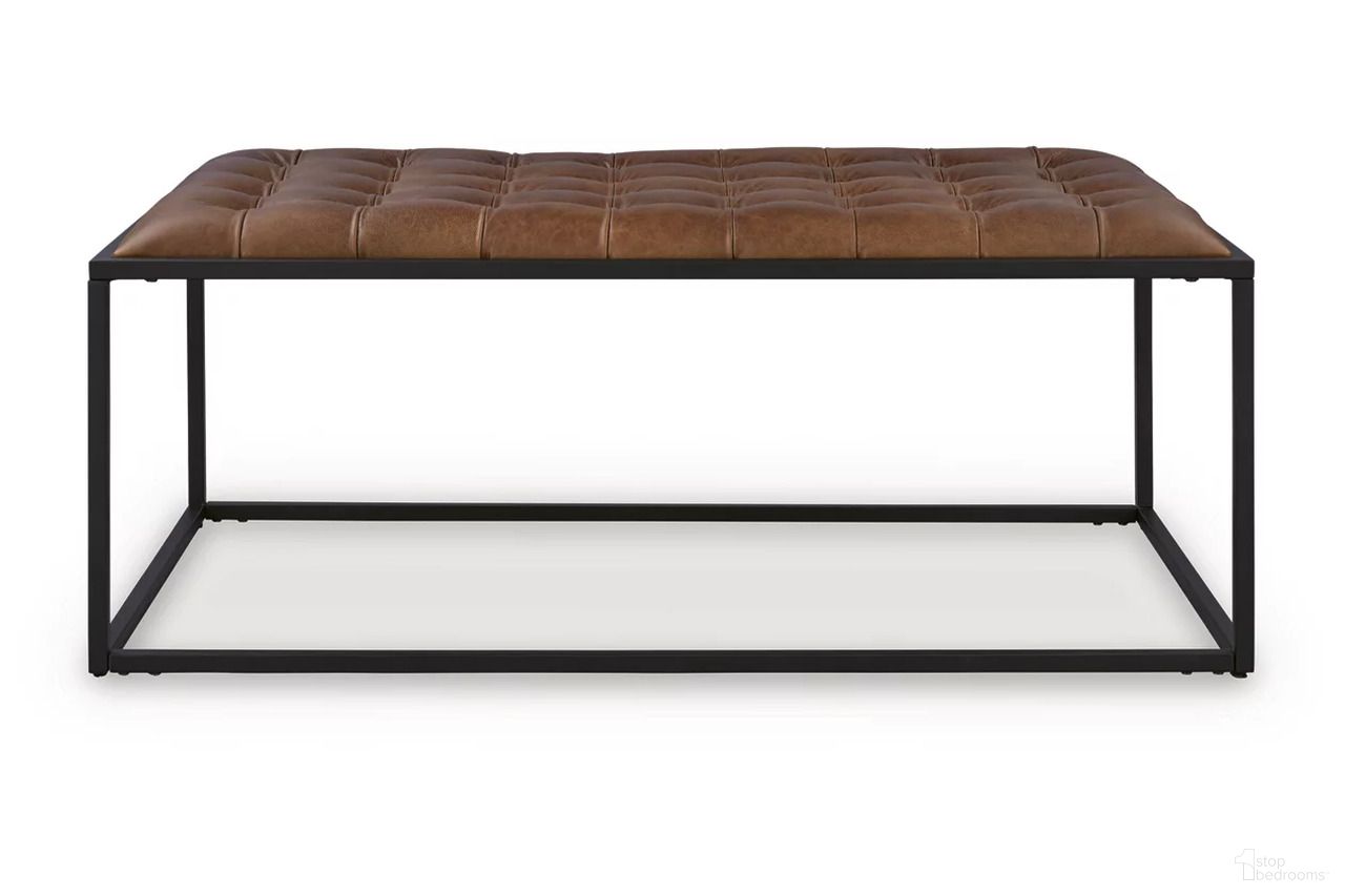 The appearance of Junsor Coffee Table Ottoman In Brown and Black designed by Signature Design by Ashley in the transitional interior design. This brown/black piece of furniture  was selected by 1StopBedrooms from Junsor Collection to add a touch of cosiness and style into your home. Sku: A3000826.