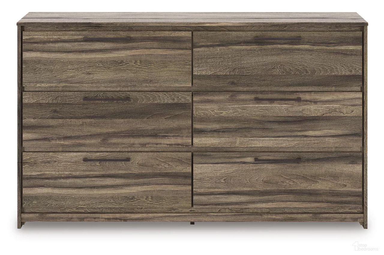 The appearance of Jusika Dresser In Brown designed by Signature Design by Ashley in the transitional interior design. This brown piece of furniture was selected by 1StopBedrooms from Jusika Collection to add a touch of cosiness and style into your home. Sku: NCB2005-31. Material: Wood.