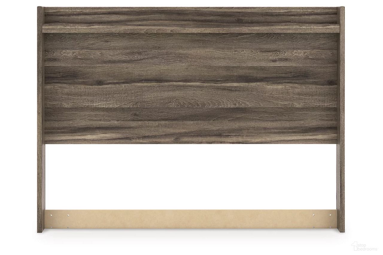 The appearance of Jusika Queen Panel Headboard In Brown designed by Signature Design by Ashley in the transitional interior design. This brown piece of furniture  was selected by 1StopBedrooms from Jusika Collection to add a touch of cosiness and style into your home. Sku: NCB2005-57. Material: Wood. Bed Size: Queen.