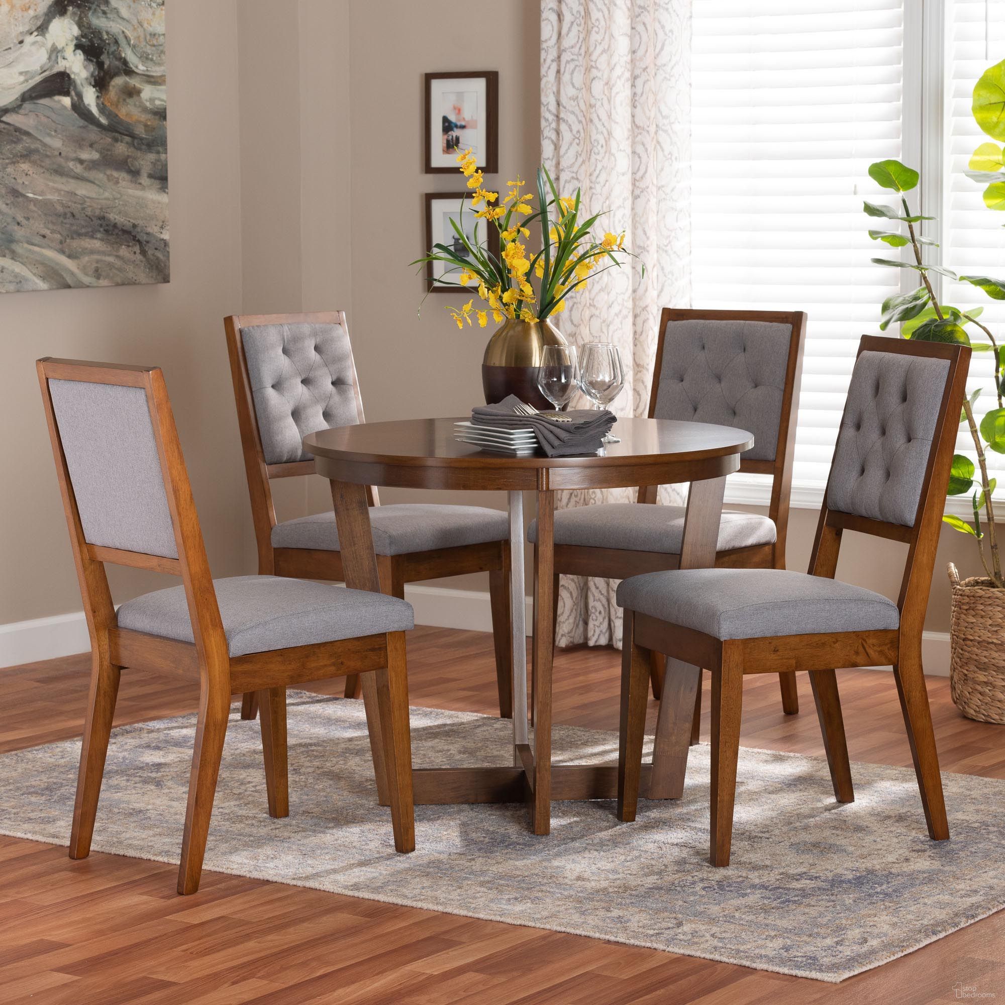 The appearance of Kala Wood 5-Piece Dining Set In Grey and Walnut Brown designed by Baxton Studio in the modern / contemporary interior design. This grey/walnut brown piece of furniture was selected by 1StopBedrooms from Kala Collection to add a touch of cosiness and style into your home. Sku: Kala-Grey/Walnut-5PC Dining Set. Table Base Style: Trestle. Table Top Shape: Round. Material: Rubberwood. Size: 35".