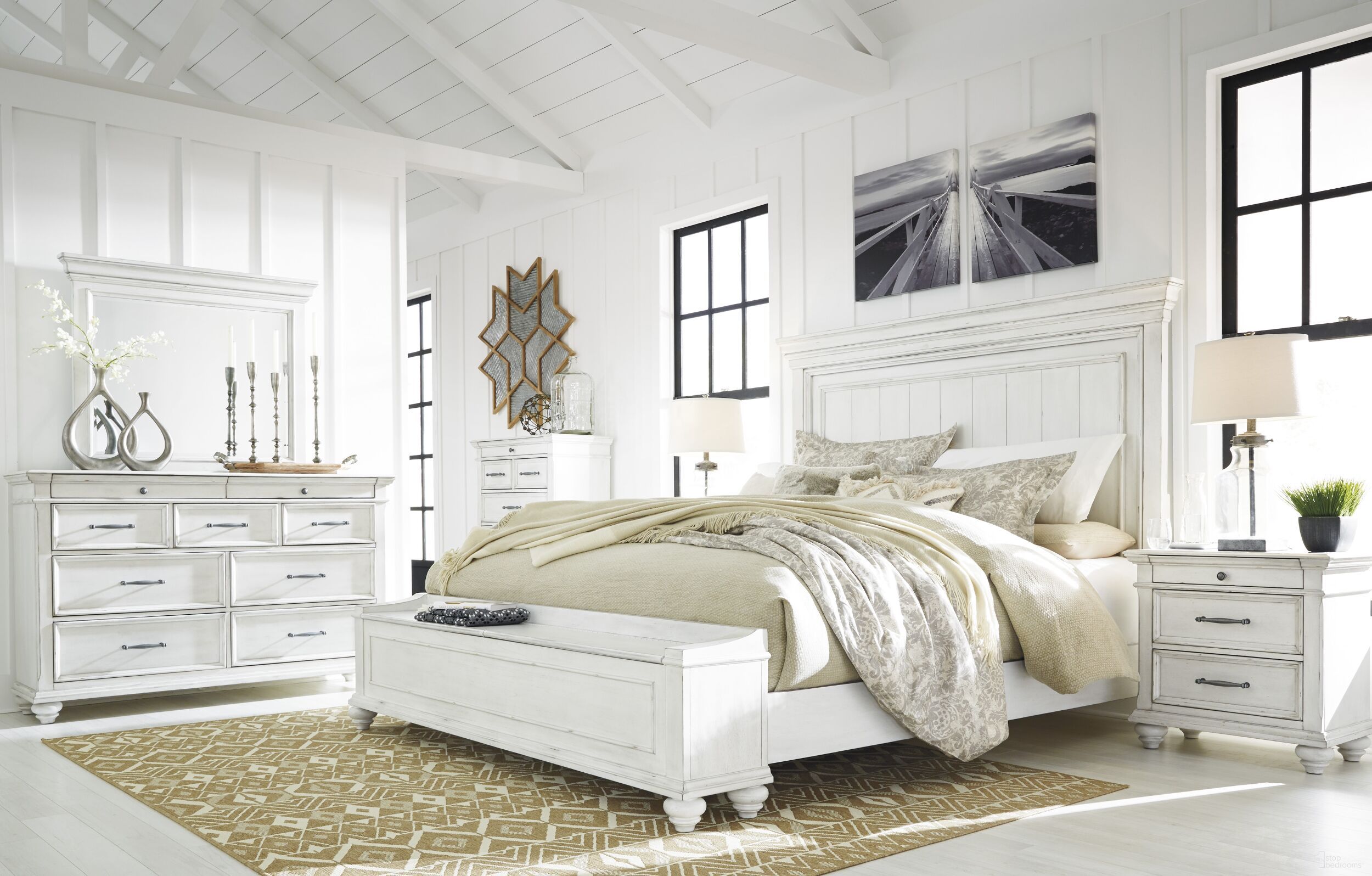 The appearance of Kanwyn Bedroom Set In White Wash designed by Signature Design by Ashley in the transitional interior design. This white wash piece of furniture was selected by 1StopBedrooms from Kanwyn Collection to add a touch of cosiness and style into your home. Sku: B777-54S;B777-57;B777-96;B777-93. Bed Type: Panel Bed. Material: Wood. Bed Size: Queen.