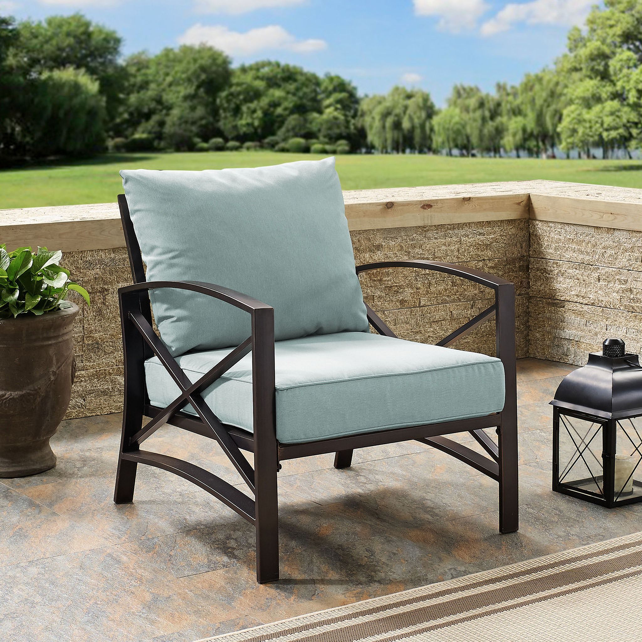 The appearance of Kaplan Outdoor Chair In Mist and Oil Rubbed Bronze designed by Crosley Brands in the traditional interior design. This mist piece of furniture was selected by 1StopBedrooms from Kaplan Collection to add a touch of cosiness and style into your home. Sku: CO6109-BZ;CO7421-MI. Material: Polyester.
