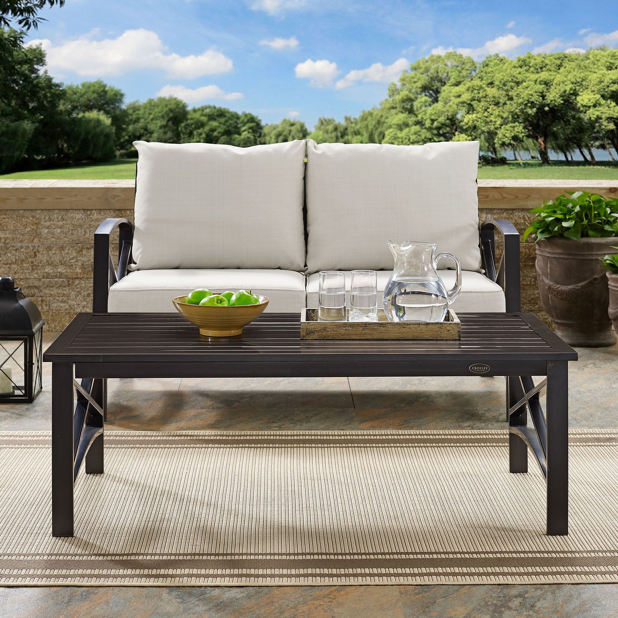 The appearance of Kaplan Outdoor Coffee Table In Oil Rubbed Bronze designed by Crosley Brands in the traditional interior design. This oil rubbed bronze piece of furniture  was selected by 1StopBedrooms from Kaplan Collection to add a touch of cosiness and style into your home. Sku: CO6207-BZ. Material: Steel.