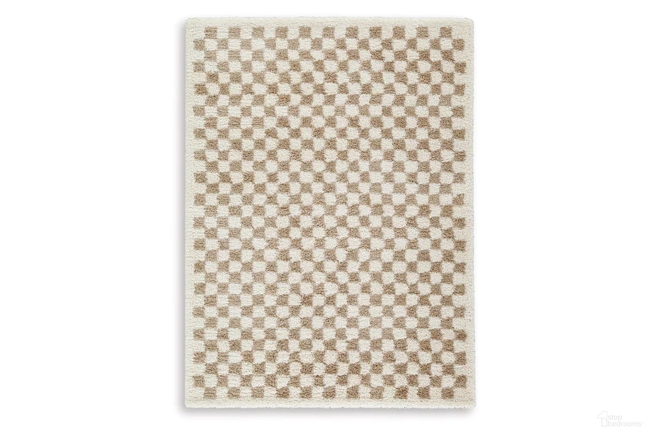 The appearance of Karamen Medium Rug In Taupe/Ivory designed by Signature Design by Ashley in the transitional interior design. This taupe/ivory piece of furniture  was selected by 1StopBedrooms from Karamen Collection to add a touch of cosiness and style into your home. Sku: R407342. Material: Fabric.