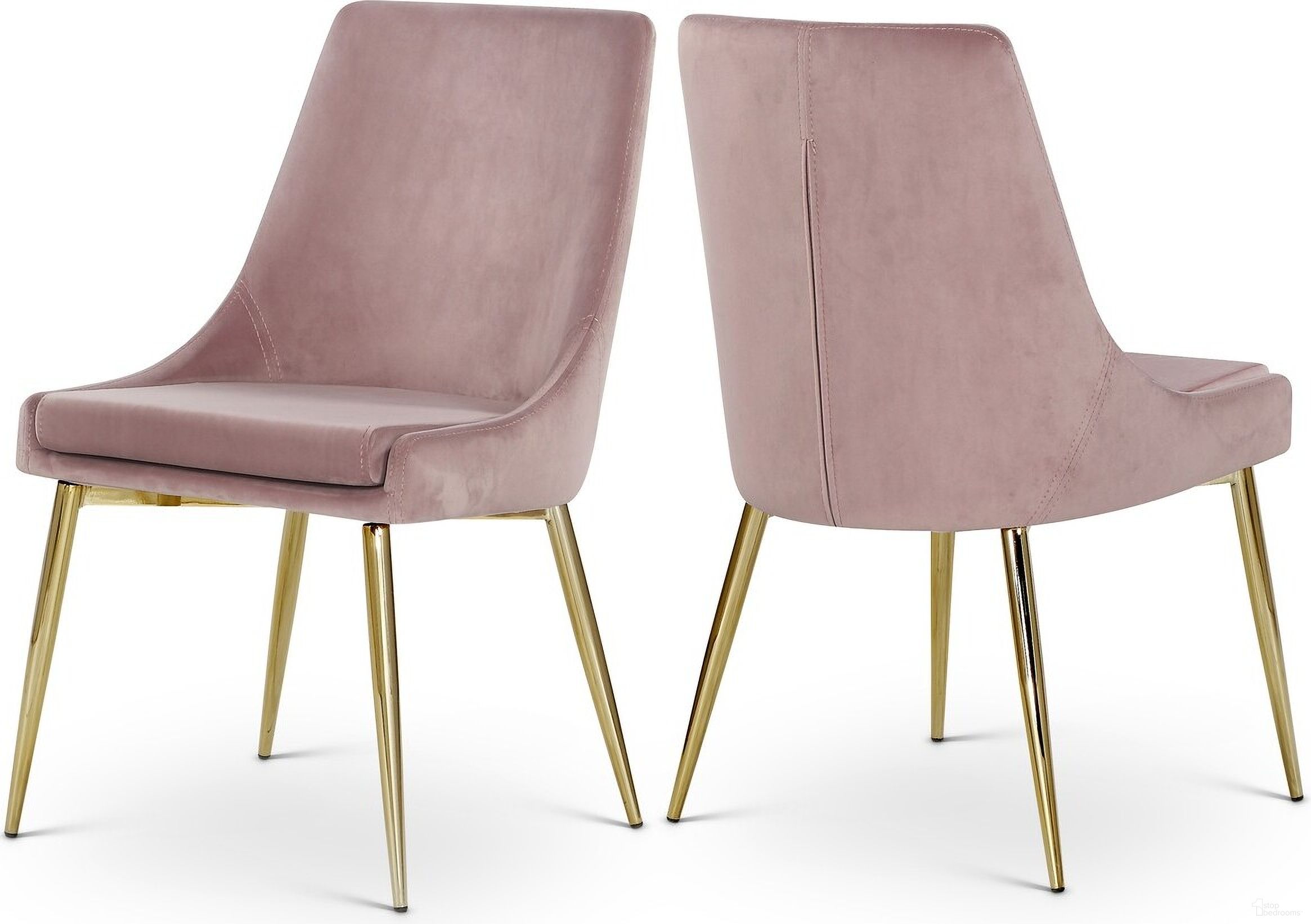 The appearance of Karina Velvet Dining Chair Set of 2 In Pink designed by Meridian in the modern / contemporary interior design. This pink piece of furniture was selected by 1StopBedrooms from Karina Collection to add a touch of cosiness and style into your home. Sku: 783Pink-C. Material: Velvet. Chair Type: Side Chair.