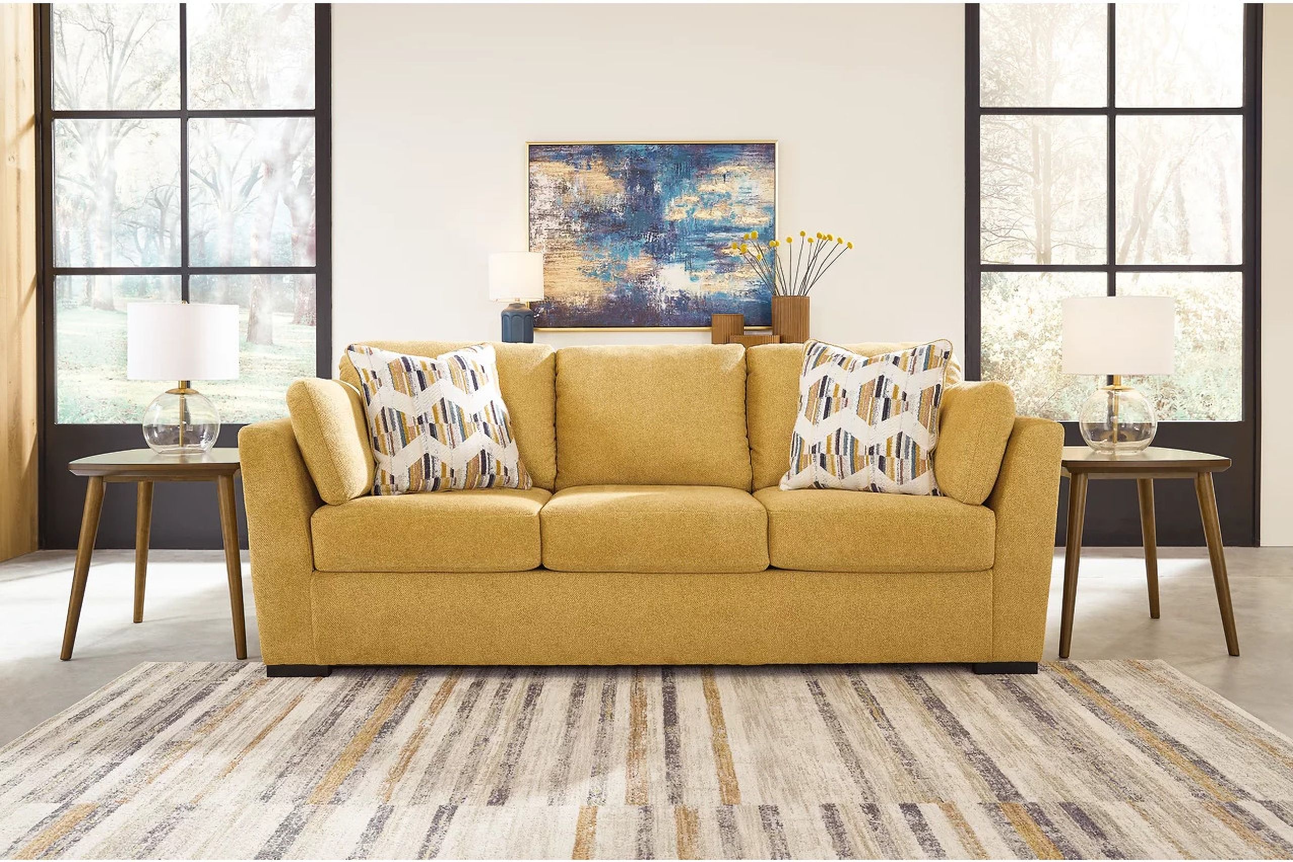 The appearance of Keerwick Sofa In Sunflower designed by Signature Design by Ashley in the modern / contemporary interior design. This sunflower piece of furniture was selected by 1StopBedrooms from Keerwick Collection to add a touch of cosiness and style into your home. Sku: 6750638. Material: Fabric.