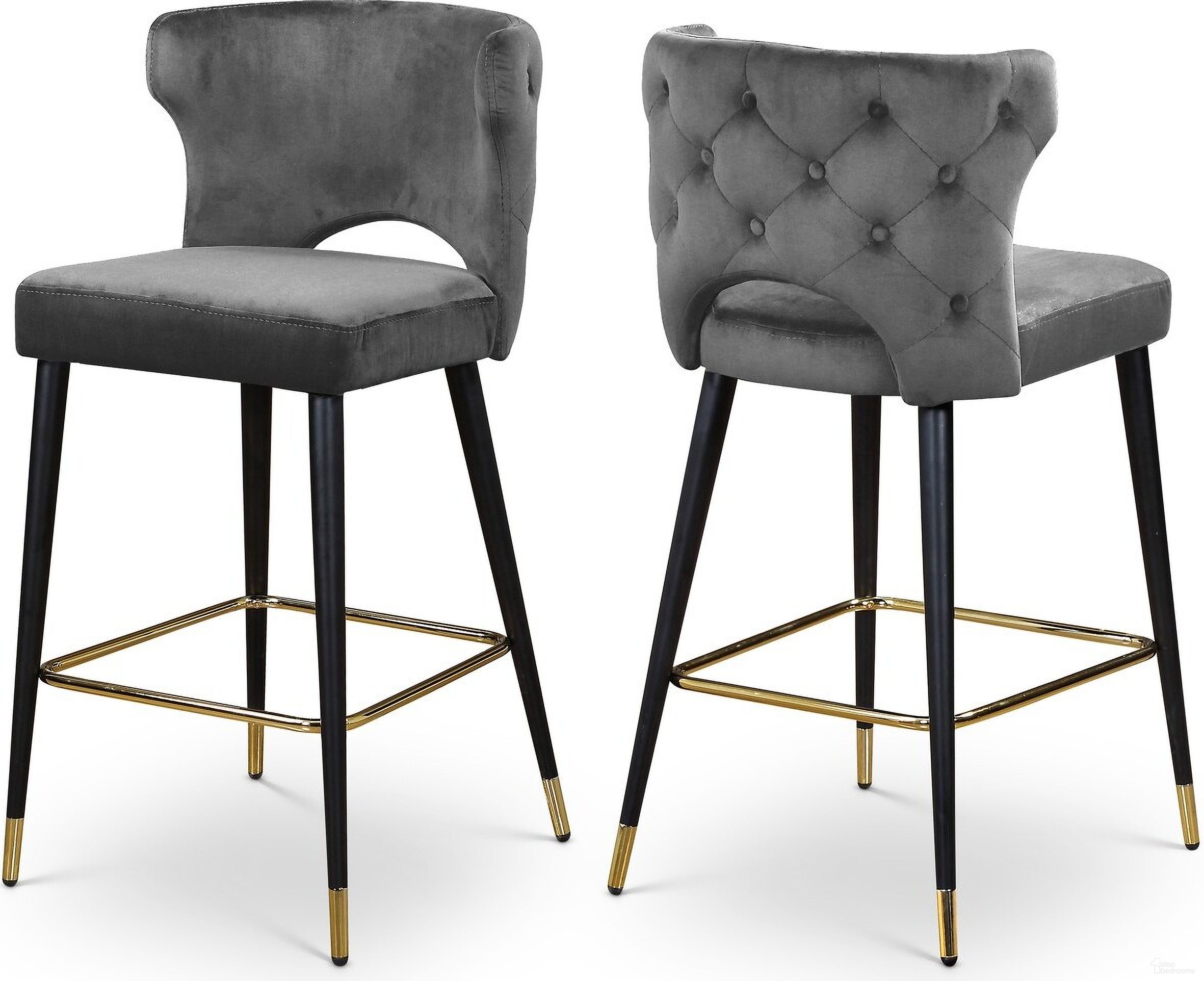 The appearance of Kelly Velvet Stool Set of 2 In Grey designed by Meridian in the modern / contemporary interior design. This grey piece of furniture was selected by 1StopBedrooms from Kelly Collection to add a touch of cosiness and style into your home. Sku: 791Grey-C. Material: Velvet.