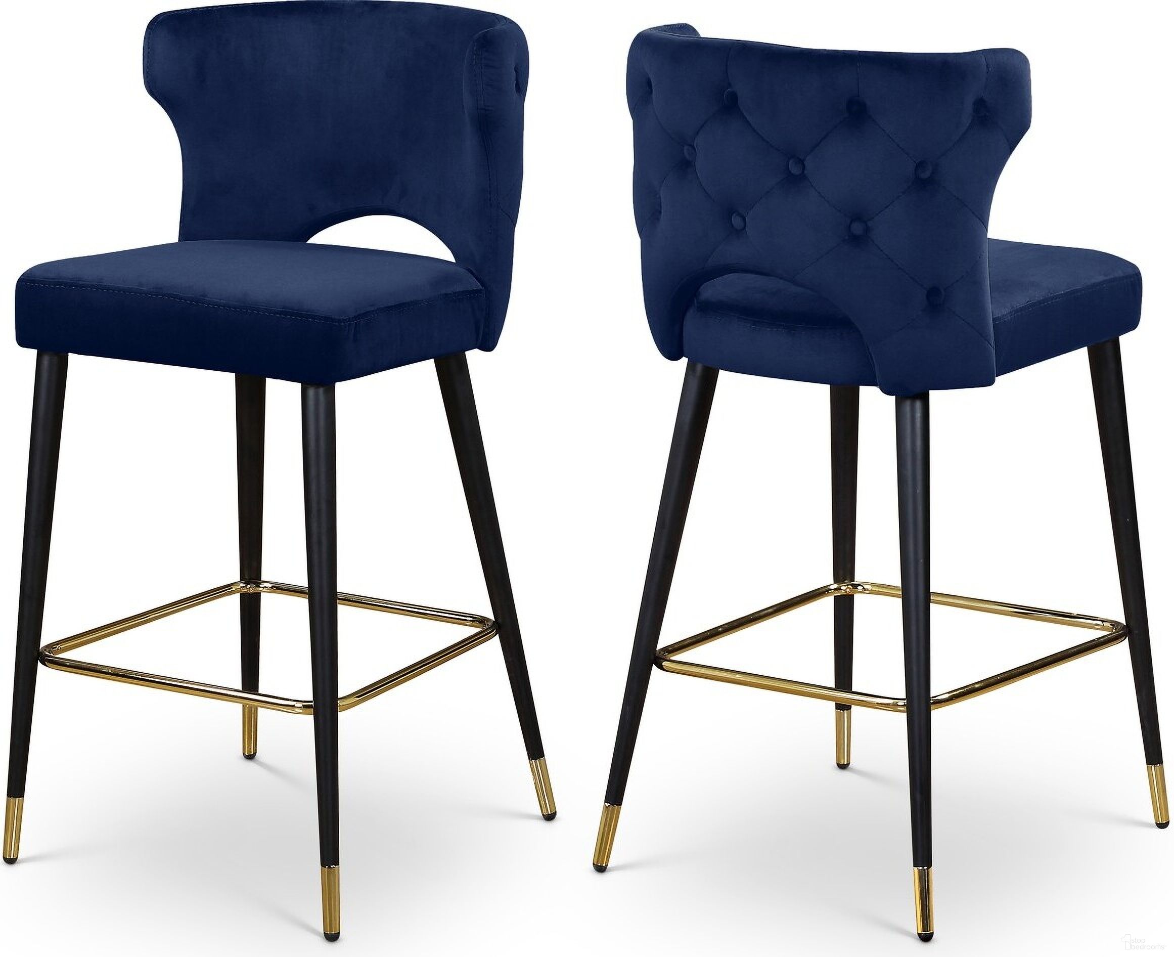 The appearance of Kelly Velvet Stool Set of 2 In Navy designed by Meridian in the modern / contemporary interior design. This navy piece of furniture  was selected by 1StopBedrooms from Kelly Collection to add a touch of cosiness and style into your home. Sku: 791Navy-C. Material: Velvet.