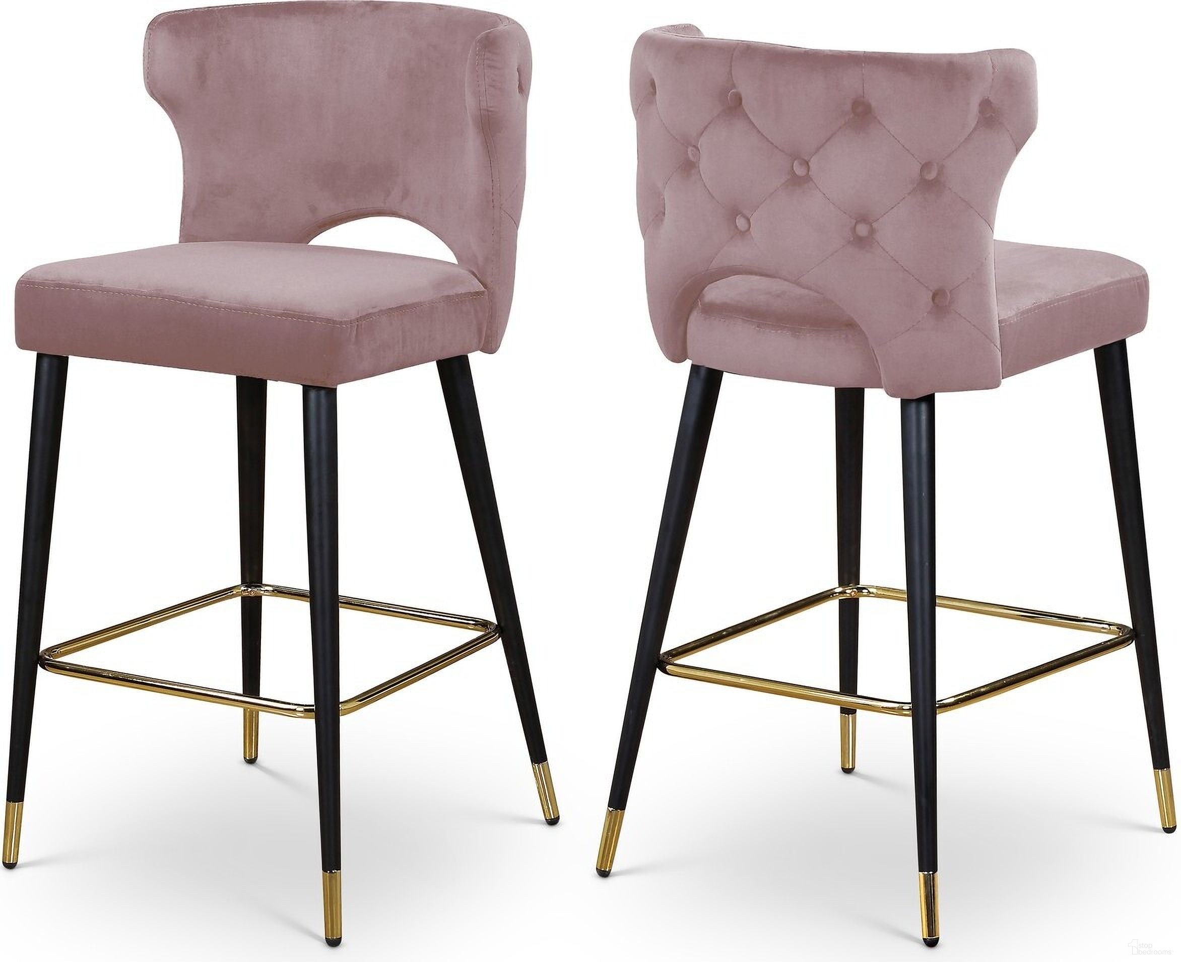 The appearance of Kelly Velvet Stool Set of 2 In Pink designed by Meridian in the modern / contemporary interior design. This pink piece of furniture was selected by 1StopBedrooms from Kelly Collection to add a touch of cosiness and style into your home. Sku: 791Pink-C. Material: Velvet.