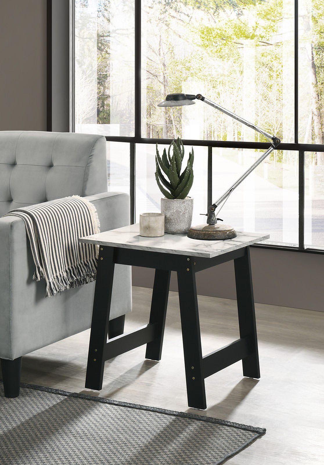 The appearance of Kenzo 19 Inch End Table with Faux Marble Top In Black designed by Lilola Home in the modern / contemporary interior design. This black piece of furniture  was selected by 1StopBedrooms from Kenzo Collection to add a touch of cosiness and style into your home. Sku: 98500. Material: Lamination.