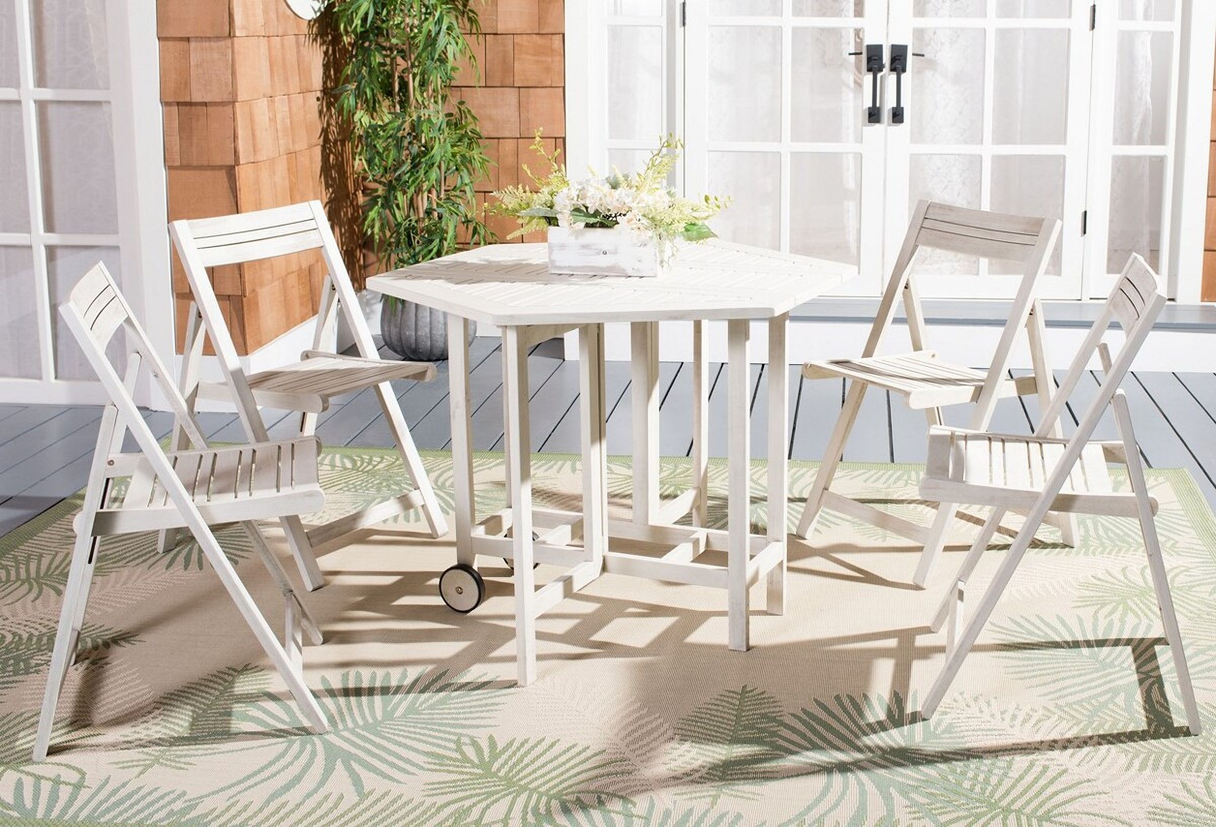 The appearance of Kerman Table and 4 Chairs in White designed by Safavieh in the modern / contemporary interior design. This white piece of furniture was selected by 1StopBedrooms from Kerman Collection to add a touch of cosiness and style into your home. Sku: PAT7000D. Material: Wood.
