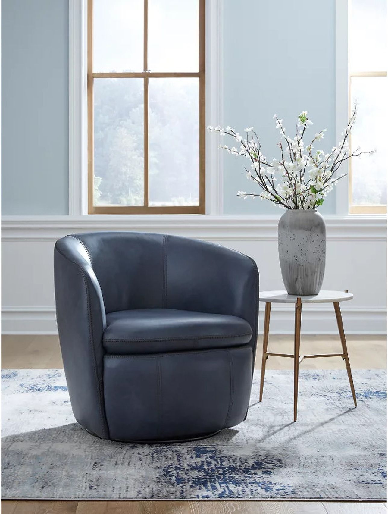 Kierreys Swivel Chair In Ocean