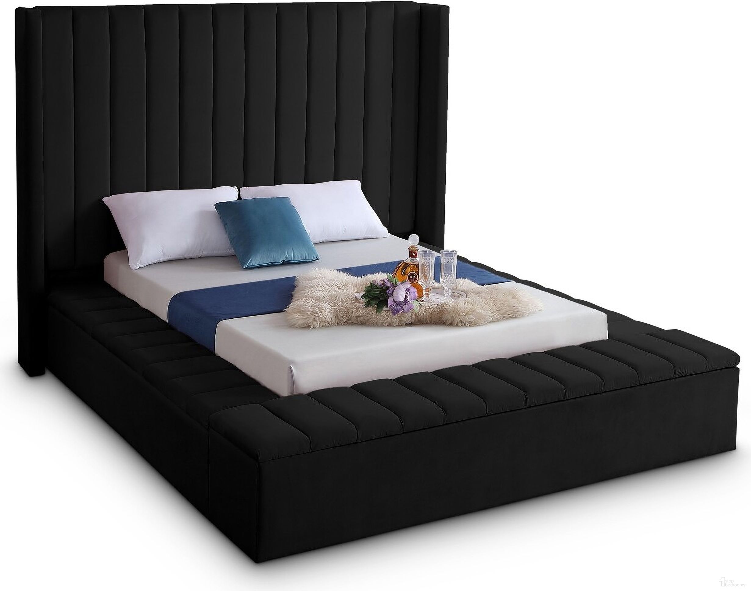 The appearance of Kiki Velvet Queen Bed In Black designed by Meridian in the modern / contemporary interior design. This black piece of furniture was selected by 1StopBedrooms from Kiki Collection to add a touch of cosiness and style into your home. Sku: KikiBlack-Q Box 1/3 (HB/Slats);KikiBlack-Q Box 2/3 (FB Ottoman/Siderail's Top Upholstered Part/Hardware/Wing);KikiBlack-Q Box 3/3 (4 Siderails/Bottom Board of Siderail/Metal Bar). Bed Type: Storage Bed. Bed Size: Queen. Material: Velvet.