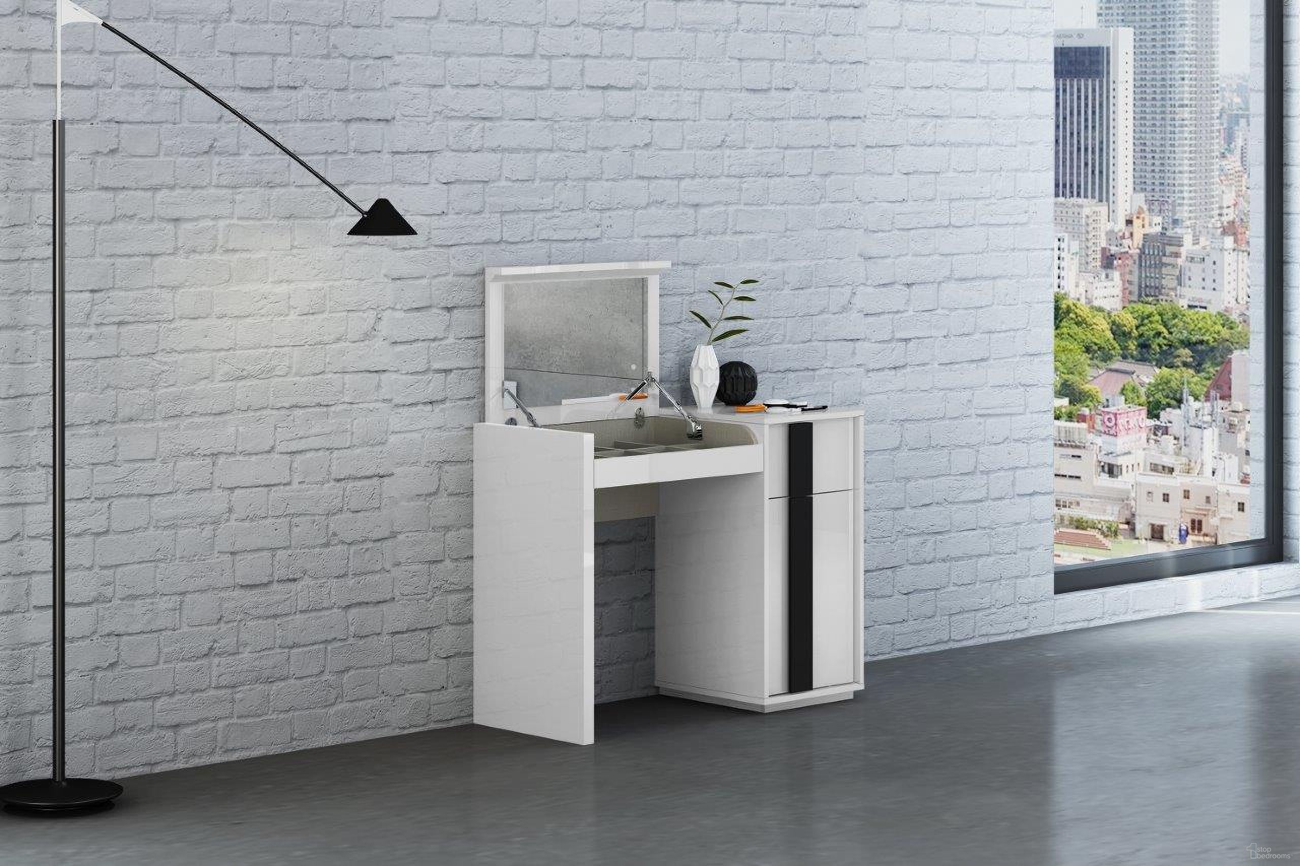 The appearance of Kimberly Vanity Dresser In High Gloss White With Mirror designed by Whiteline Modern Living in the modern / contemporary interior design. This white piece of furniture was selected by 1StopBedrooms from Kimberly Collection to add a touch of cosiness and style into your home. Sku: VA1617-WHT/BLK. Material: Wood.