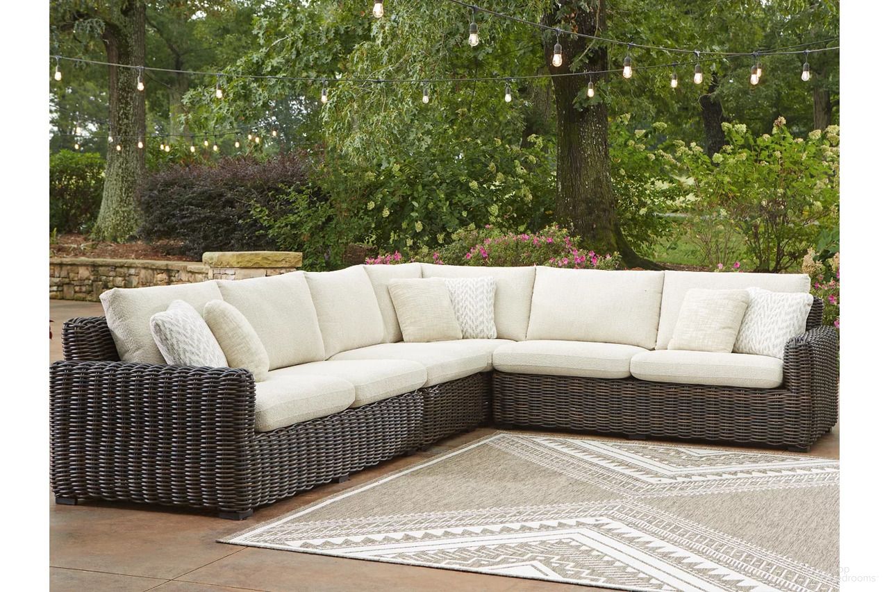The appearance of Kimora 4-Piece Outdoor Sectional In Beige and Dark Brown designed by Signature Design by Ashley in the transitional interior design. This beige and dark brown piece of furniture was selected by 1StopBedrooms from Kimora Collection to add a touch of cosiness and style into your home. Sku: P711-877;P711-846;P711-854. Material: Fabric.