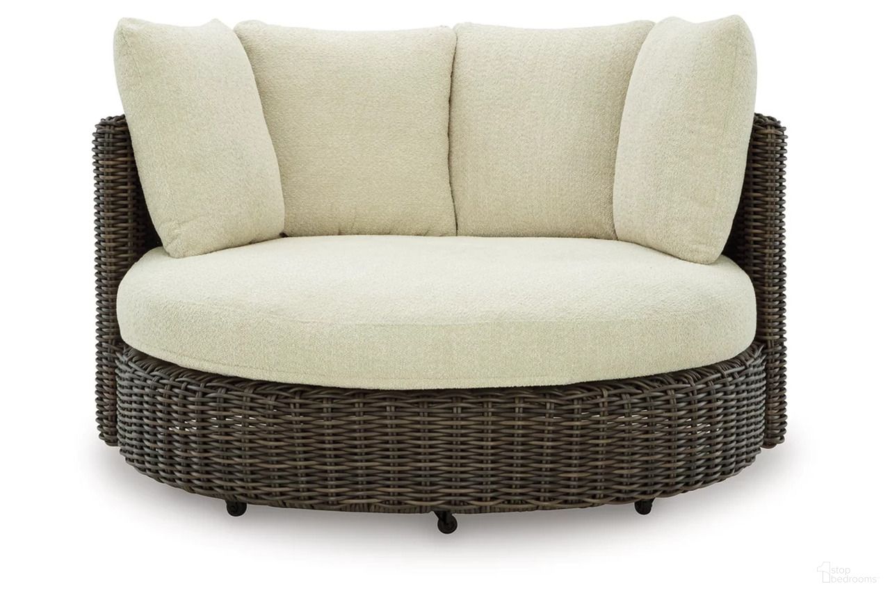 The appearance of Kimora Outdoor Swivel Lounge Chair with Cushion In Beige and Dark Brown designed by Signature Design by Ashley in the transitional interior design. This beige and dark brown piece of furniture was selected by 1StopBedrooms from Kimora Collection to add a touch of cosiness and style into your home. Sku: P711-810. Material: Fabric.