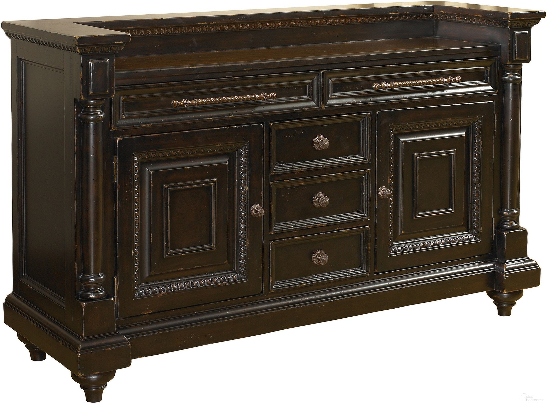 The appearance of Kingstown Maldive Buffet In Tamarind designed by Tommy Bahama in the traditional interior design. This tamarind piece of furniture  was selected by 1StopBedrooms from Kingstown Collection to add a touch of cosiness and style into your home. Sku: 619-852. Material: Leather.