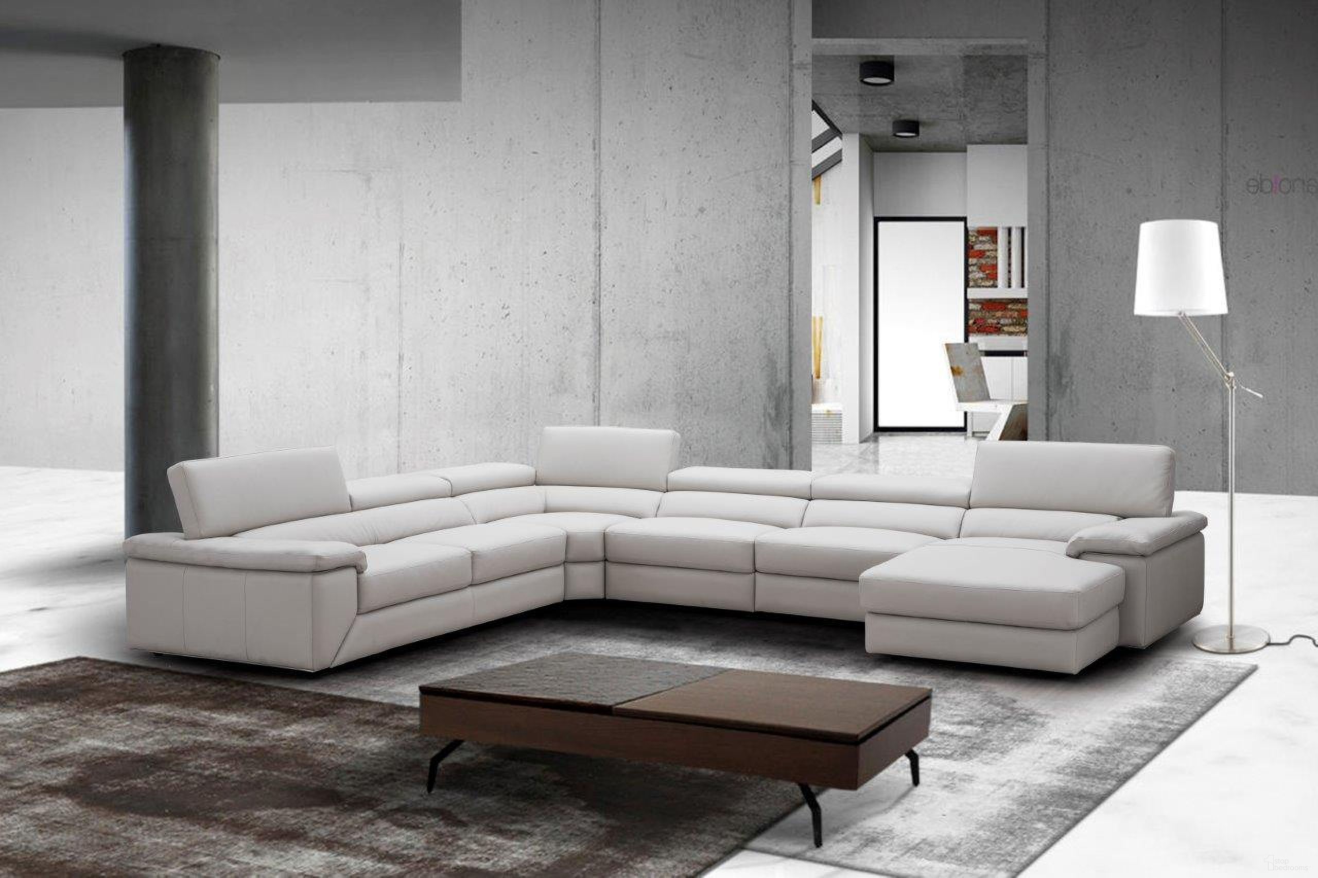 The appearance of Kobe Right Facing Leather Sectional In Silver Grey designed by J&M in the modern / contemporary interior design. This silver grey piece of furniture was selected by 1StopBedrooms from Kobe Collection to add a touch of cosiness and style into your home. Sku: 181114-RHFC. Material: Leather. Layout: Sofa & Chaise. Orientation: RAF.