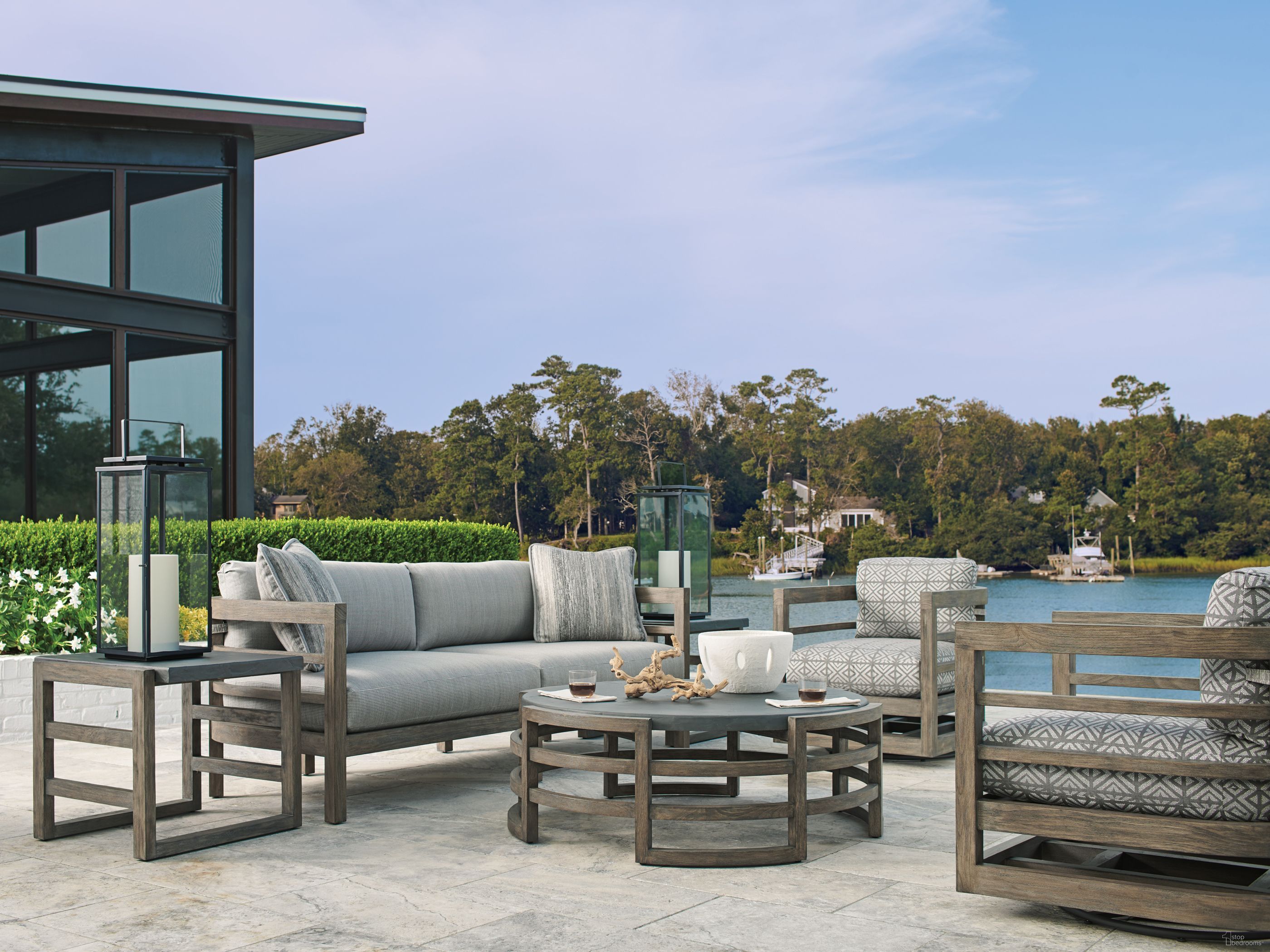 The appearance of La Jolla Taupe Outdoor Round Occasional Table Set designed by Tommy Bahama in the modern / contemporary interior design. This taupe piece of furniture was selected by 1StopBedrooms from La Jolla Collection to add a touch of cosiness and style into your home. Sku: 3950-947;3950-955. Material: Wood.
