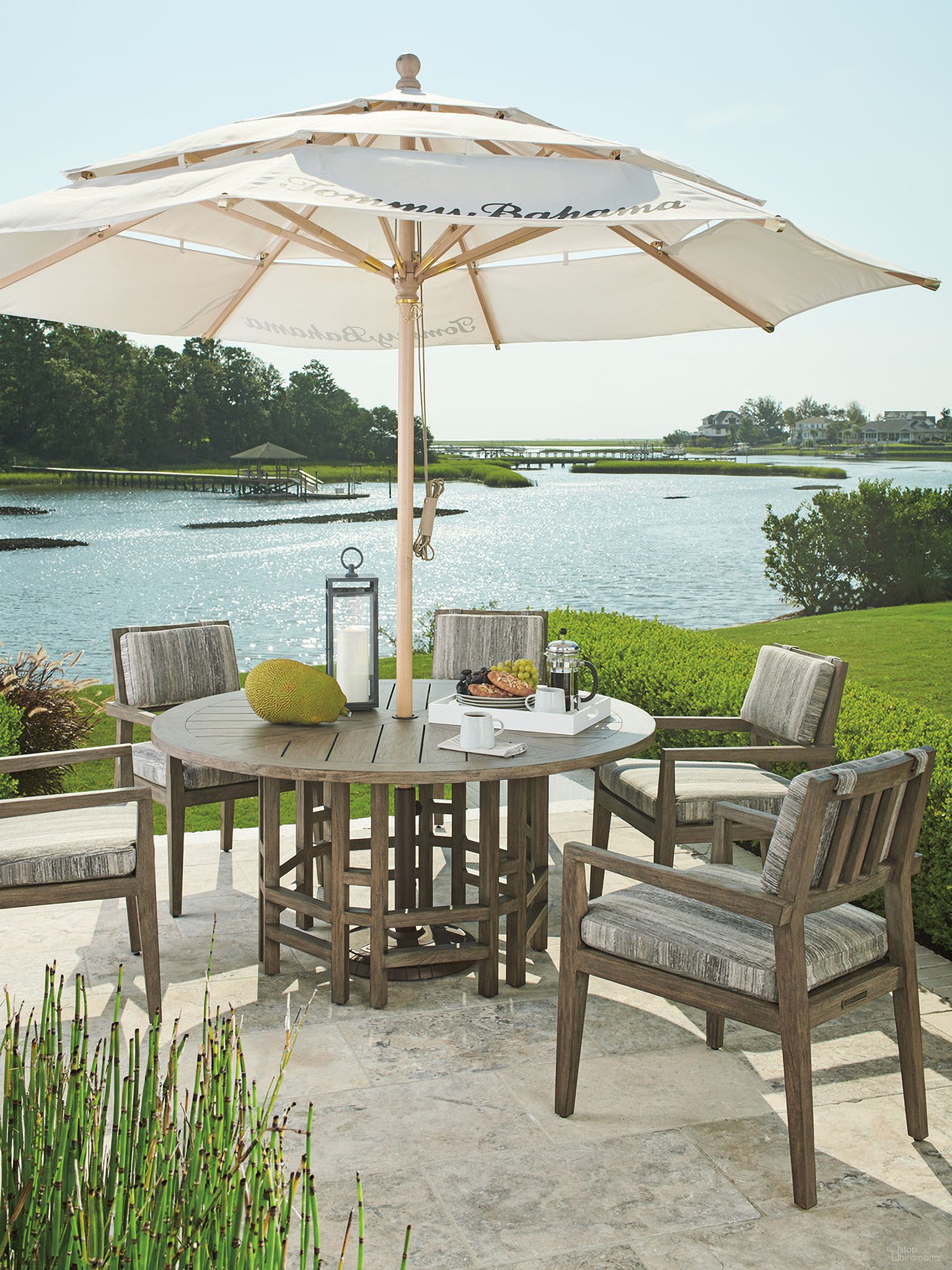 The appearance of La Jolla Round Dining Set In Taupe designed by Tommy Bahama in the modern / contemporary interior design. This taupe piece of furniture was selected by 1StopBedrooms from La Jolla Collection to add a touch of cosiness and style into your home. Sku: 3950-875C;3950-13-40. Table Base Style: Pedestal. Table Top Shape: Round. Material: Wood.