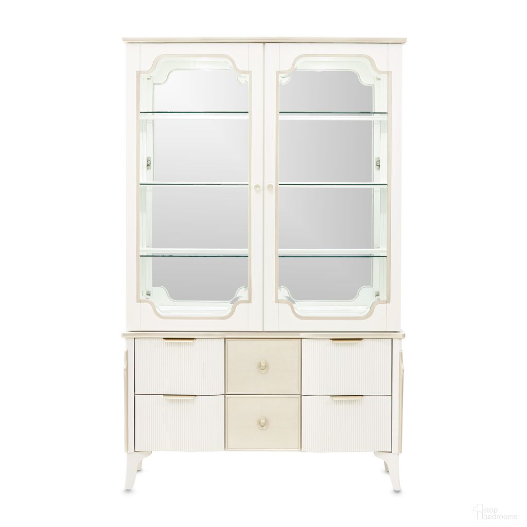 The appearance of La Marisia Display Cabinet In Creamy Pearl designed by Michael Amini in the modern / contemporary interior design. This creamy pearl piece of furniture was selected by 1StopBedrooms from La Marisia Collection to add a touch of cosiness and style into your home. Sku: 9089209T-112;9089209BSA-112. Material: Poplar.