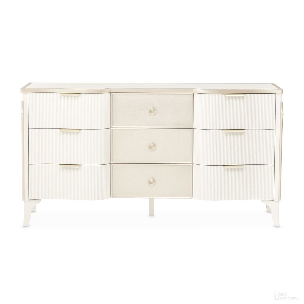 The appearance of La Marisia Dresser In Creamy Pearl designed by Michael Amini in the modern / contemporary interior design. This creamy pearl piece of furniture was selected by 1StopBedrooms from La Marisia Collection to add a touch of cosiness and style into your home. Sku: 9089050SA-112. Material: Poplar.