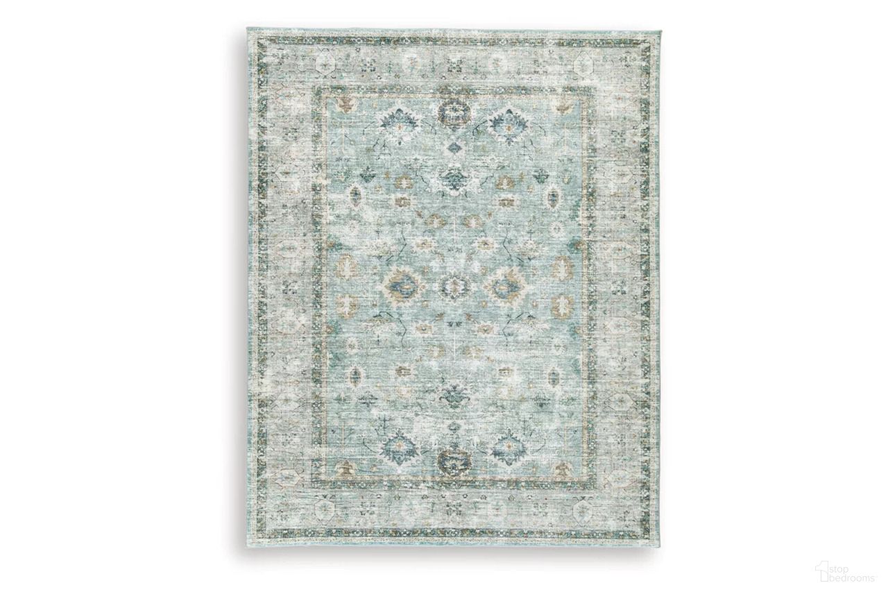 The appearance of Ladstoney 7'6" x 9'6" Area Rug In Teal/Beige/Ochre designed by Signature Design by Ashley in the traditional interior design. This teal/beige/ochre piece of furniture was selected by 1StopBedrooms from Ladstoney Collection to add a touch of cosiness and style into your home. Sku: R407501.