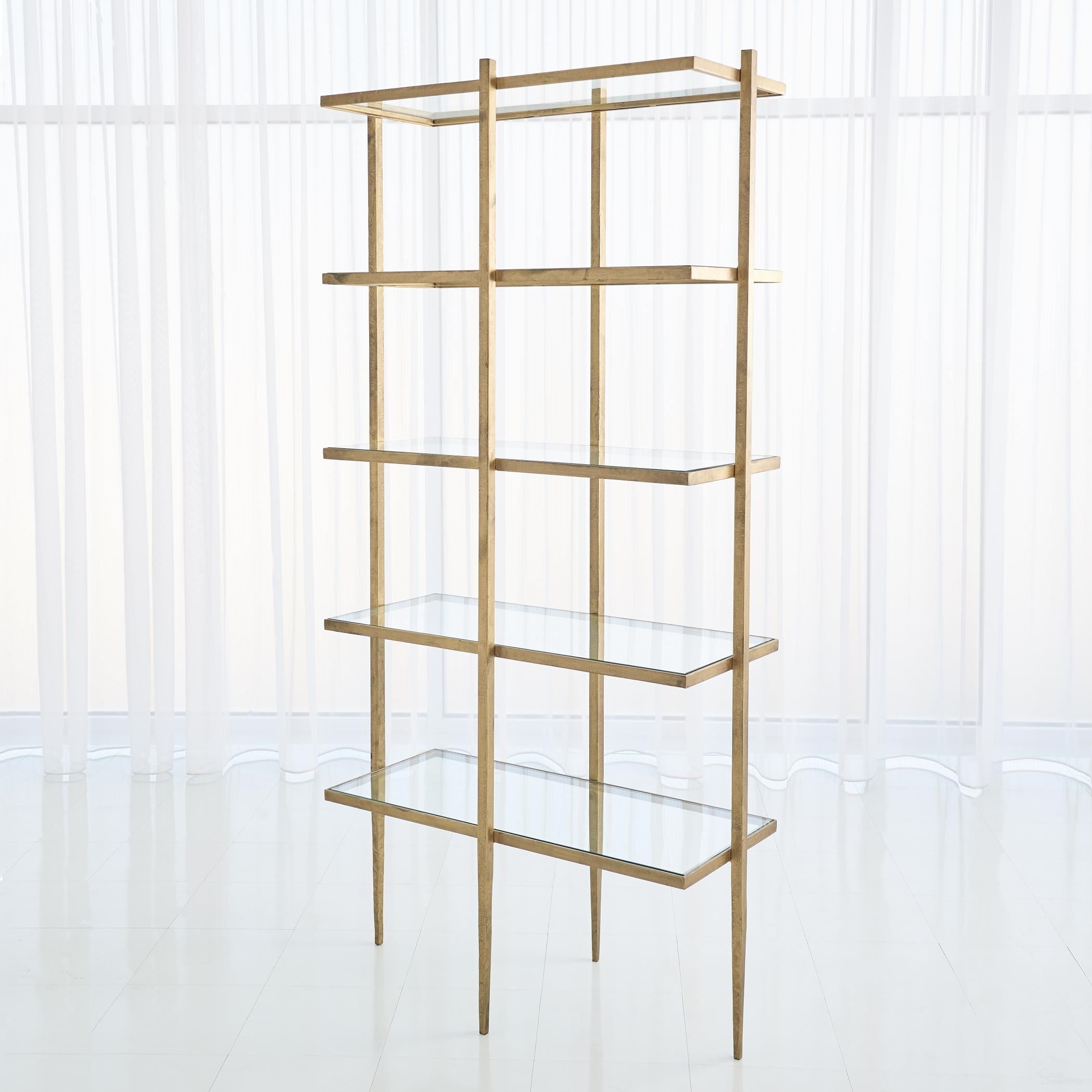 The appearance of Laforge Etagere In Antique Gold designed by Global Views in the modern / contemporary interior design. This gold piece of furniture  was selected by 1StopBedrooms from Laforge Collection to add a touch of cosiness and style into your home. Sku: 791018. Material: Iron.