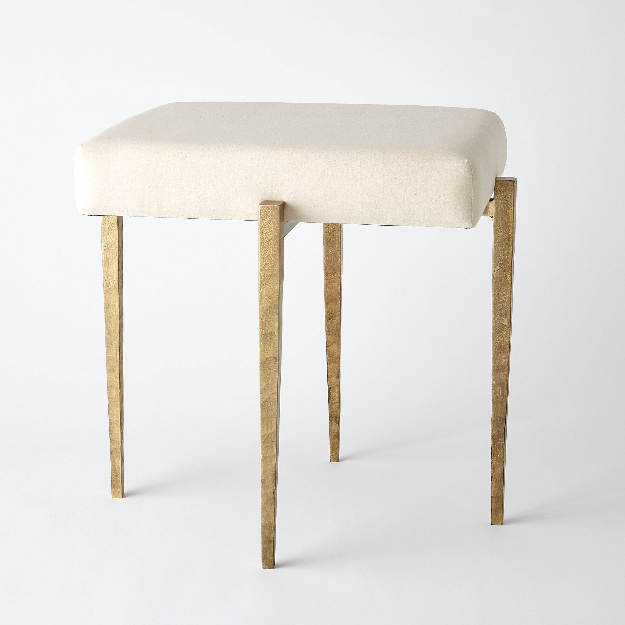 The appearance of Laforge Small Bench In Antique Gold With Muslin Cushion designed by Global Views in the modern / contemporary interior design. This gold piece of furniture  was selected by 1StopBedrooms from Laforge Collection to add a touch of cosiness and style into your home. Sku: 790865. Material: Iron.