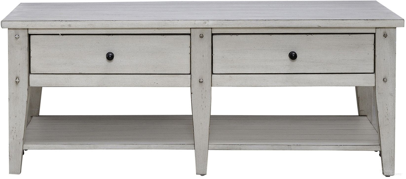 The appearance of Lake House Cocktail Table In Weathered White designed by Liberty in the rustic / southwestern interior design. This weathered white piece of furniture  was selected by 1StopBedrooms from Lake House Collection to add a touch of cosiness and style into your home. Sku: 110W-OT1010. Material: Poplar Solid.