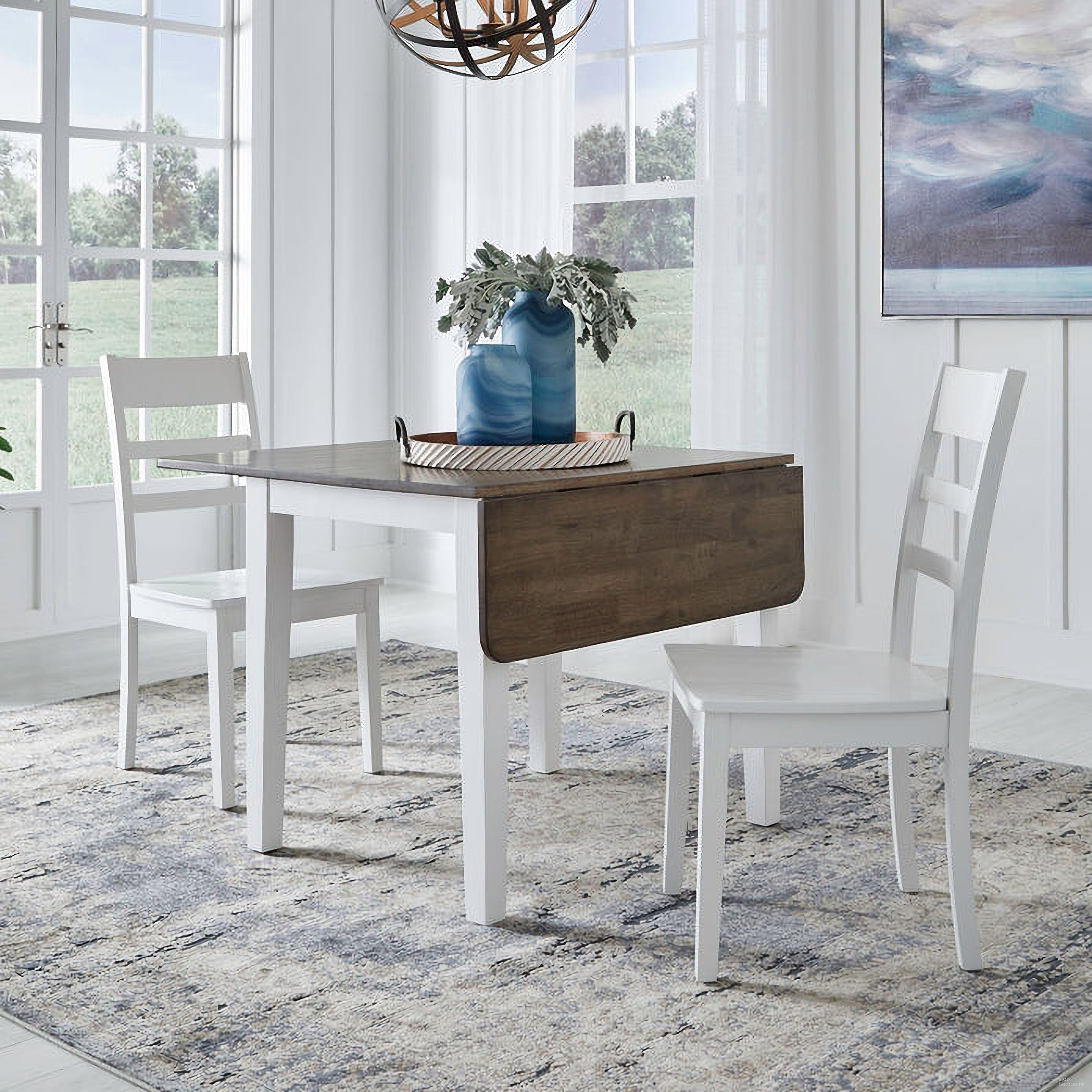 The appearance of Landale Drop Leaf Dining Set In Chestnut and White designed by Liberty in the transitional interior design. This chestnut/white piece of furniture was selected by 1StopBedrooms from Landale Collection to add a touch of cosiness and style into your home. Sku: 617-T3650;617-C2000S. Table Top Shape: Rectangular. Size: 50" x 36". Material: Solid Rubberwood.