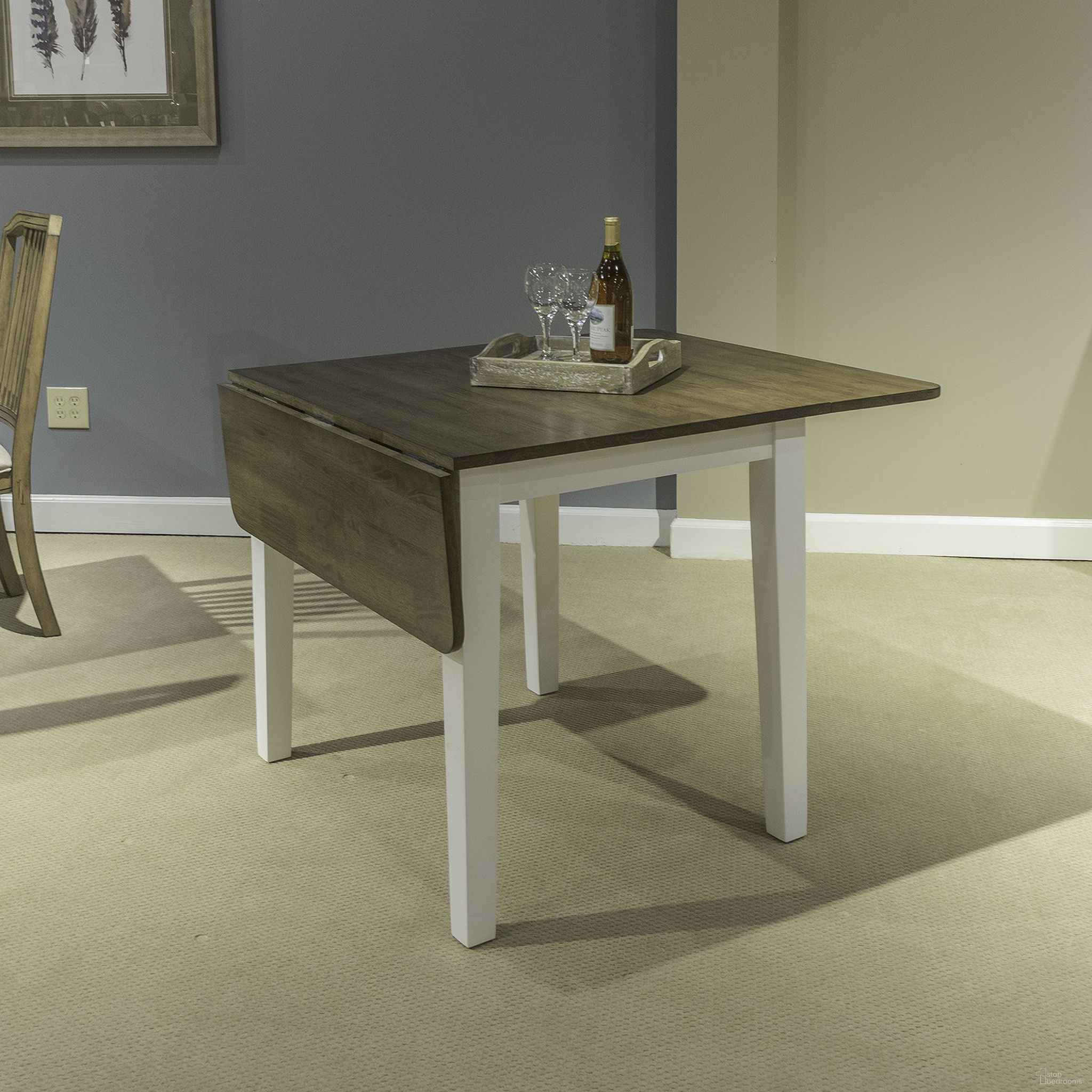 The appearance of Landale Drop Leaf Table In Chestnut and White designed by Liberty in the transitional interior design. This chestnut/white piece of furniture  was selected by 1StopBedrooms from Landale Collection to add a touch of cosiness and style into your home. Sku: 617-T3650. Table Base Style: Legs. Table Top Shape: Rectangular. Size: 50" x 36". Material: Solid Rubberwood.