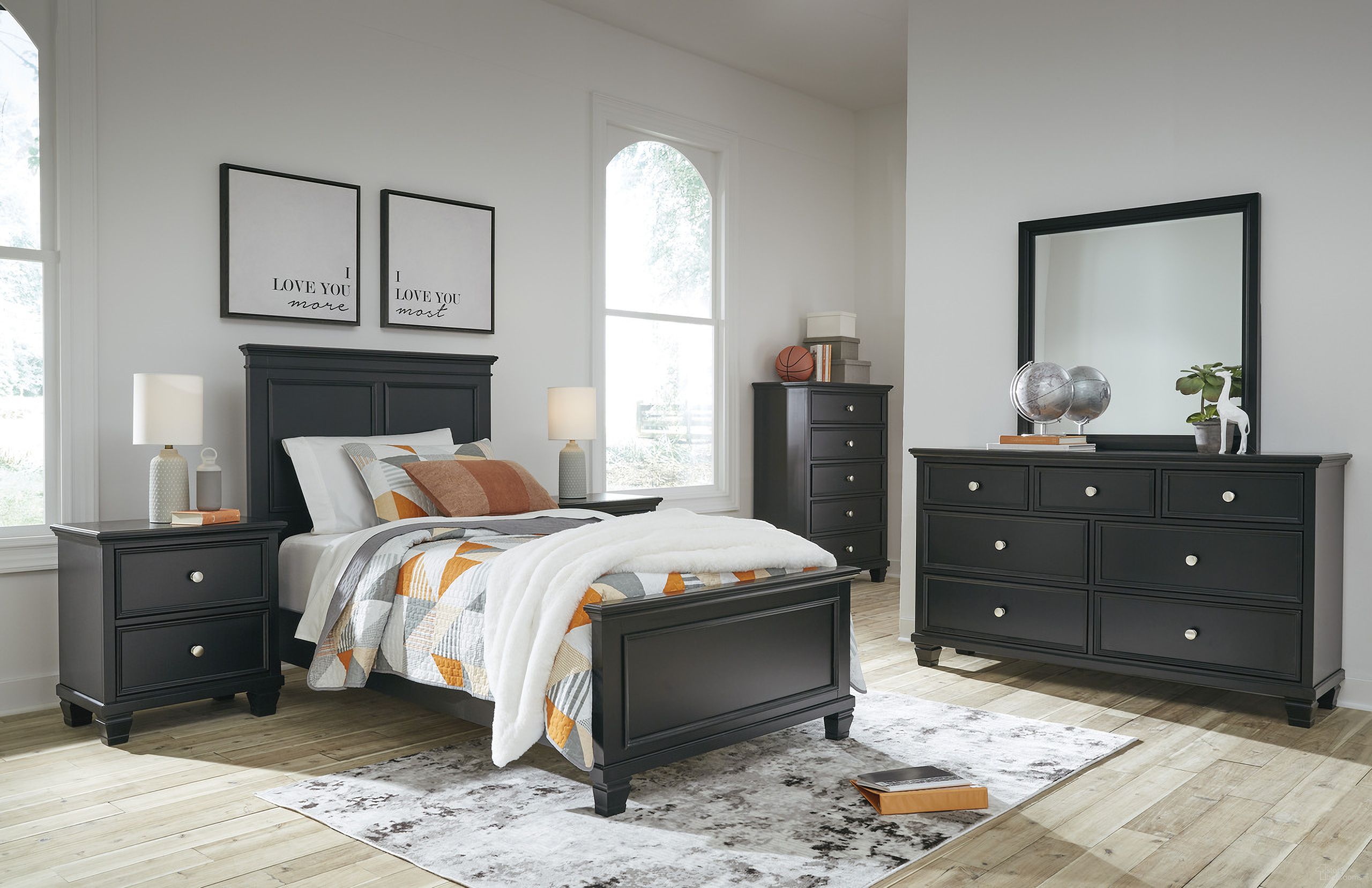 The appearance of Lanolee Youth Bedroom Set In Black designed by Signature Design by Ashley in the transitional interior design. This black piece of furniture was selected by 1StopBedrooms from Lanolee Collection to add a touch of cosiness and style into your home. Sku: B687-52;B687-53;B687-86;B687-92. Bed Type: Panel Bed. Material: Wood. Bed Size: Twin.