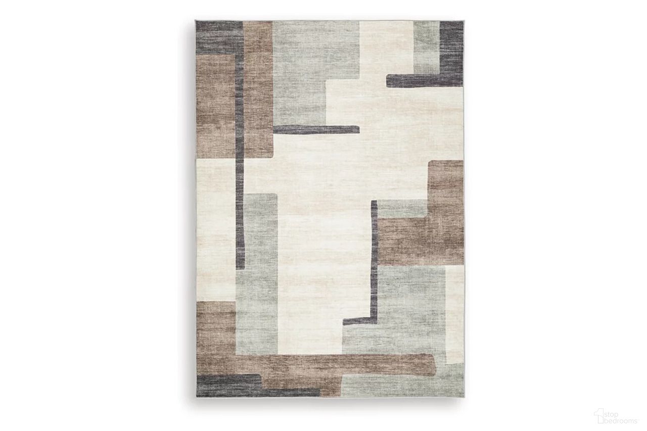 The appearance of Larkport Washable Medium Rug In Cream and Brown and Gray designed by Signature Design by Ashley in the modern / contemporary interior design. This cream/brown/gray piece of furniture  was selected by 1StopBedrooms from Larkport Collection to add a touch of cosiness and style into your home. Sku: R407412.