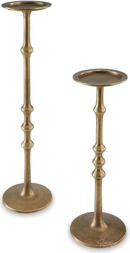 The appearance of Larwick Candle Holder Set of 2 In Antique Brass designed by Signature Design by Ashley in the modern / contemporary interior design. This antique brass piece of furniture  was selected by 1StopBedrooms from Larwick Collection to add a touch of cosiness and style into your home. Sku: A2000683. Material: Metal.