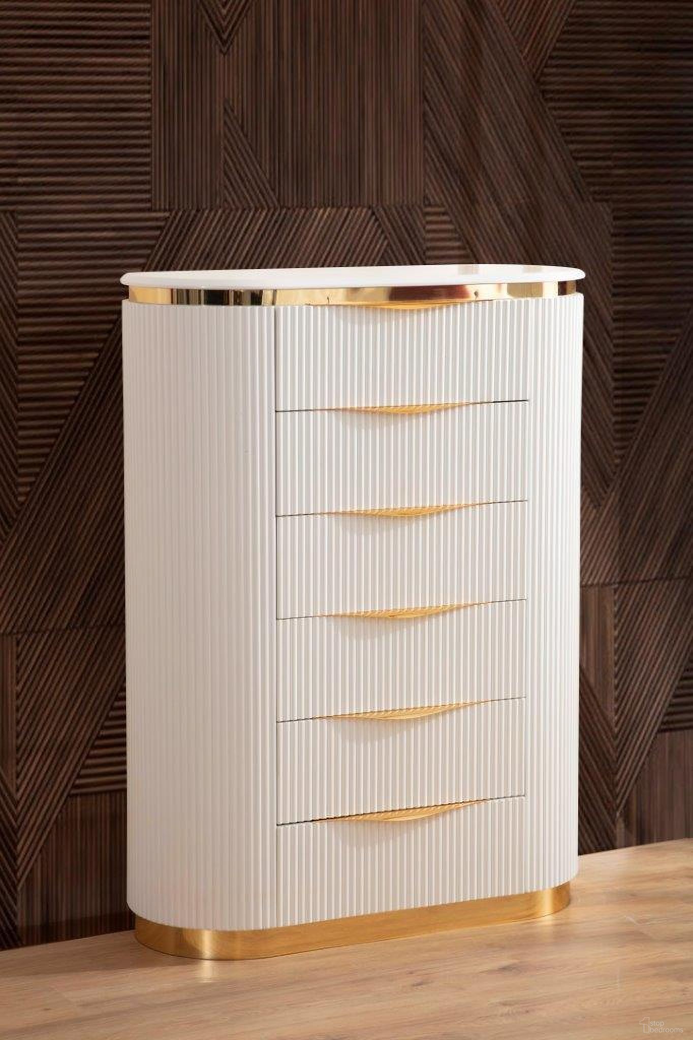 The appearance of Laura Gold Detailed Chest Made With Wood In White designed by Galaxy Home Furnishings in the modern / contemporary interior design. This white piece of furniture was selected by 1StopBedrooms from Laura Collection to add a touch of cosiness and style into your home. Sku: 698781323373. Material: Wood.