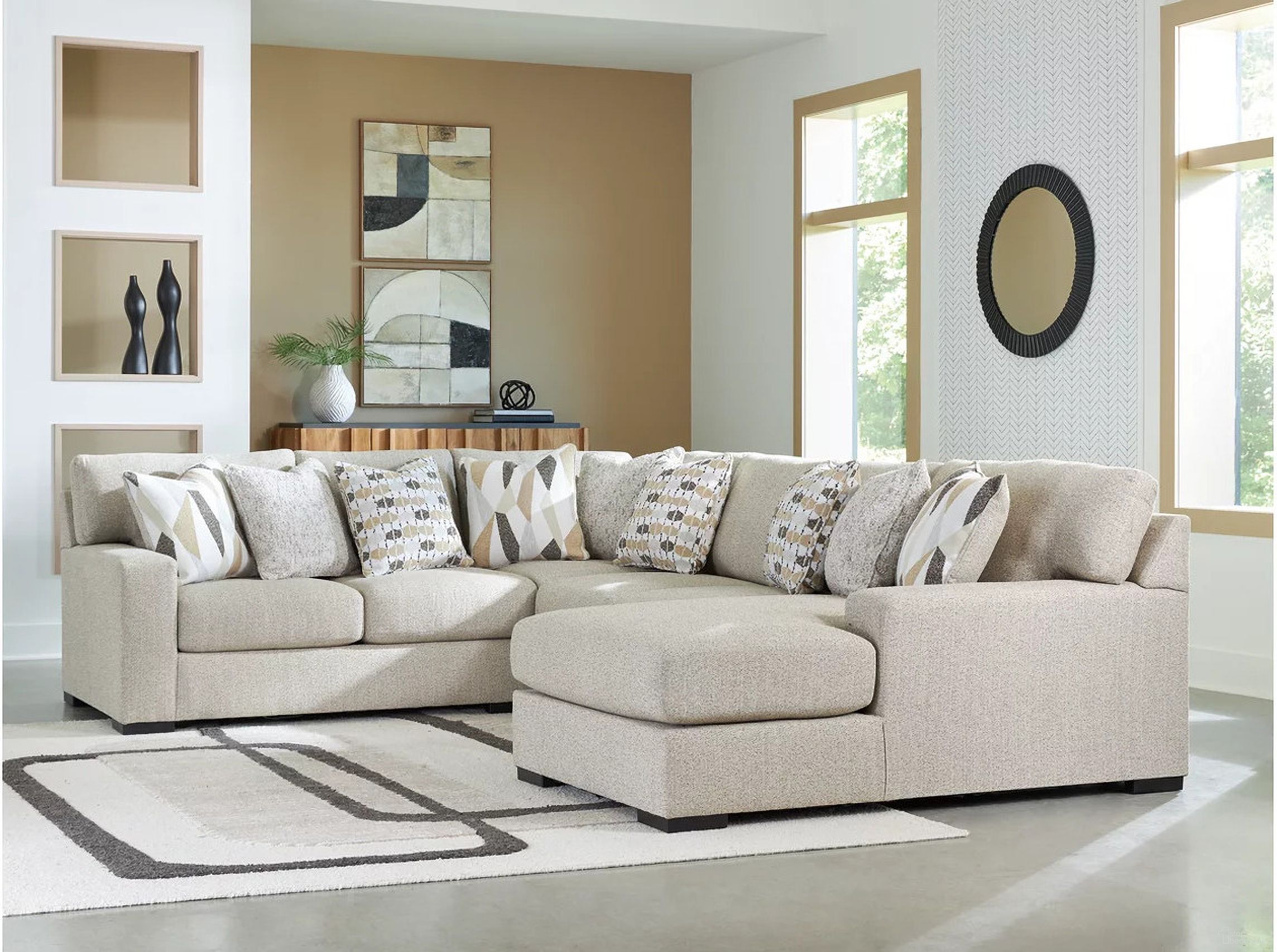 The appearance of Laurelgrove 4-Piece Sectional with RAF Chaise In Pebble designed by Signature Design by Ashley in the modern / contemporary interior design. This pebble piece of furniture  was selected by 1StopBedrooms from Laurelgrove Collection to add a touch of cosiness and style into your home. Sku: 7510517;7510534;7510555;7510577. Material: Polyester. Orientation: RAF.
