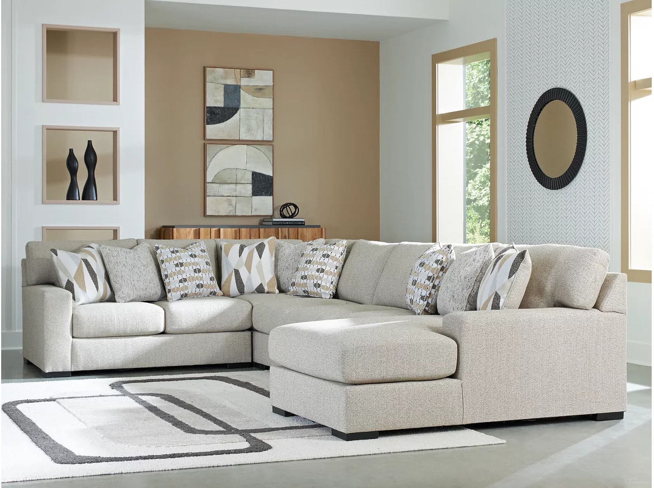 The appearance of Laurelgrove 5-Piece Sectional with RAF Chaise In Pebble designed by Signature Design by Ashley in the modern / contemporary interior design. This pebble piece of furniture  was selected by 1StopBedrooms from Laurelgrove Collection to add a touch of cosiness and style into your home. Sku: 7510517;7510534;7510546;7510555;7510577. Material: Polyester. Orientation: RAF.