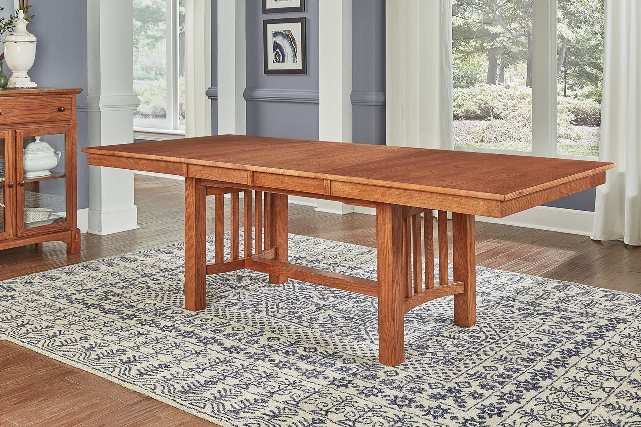 The appearance of Laurelhurst 92" Mission Oak Extendable Rectangular Trestle Dining Table designed by A-America in the modern / contemporary interior design. This brown piece of furniture  was selected by 1StopBedrooms from Laurelhurst Collection to add a touch of cosiness and style into your home. Sku: LAUOA632B;LAUOA632T. Table Base Style: Trestle. Material: Wood. Table Top Shape: Rectangular. Size: 92" x 42".